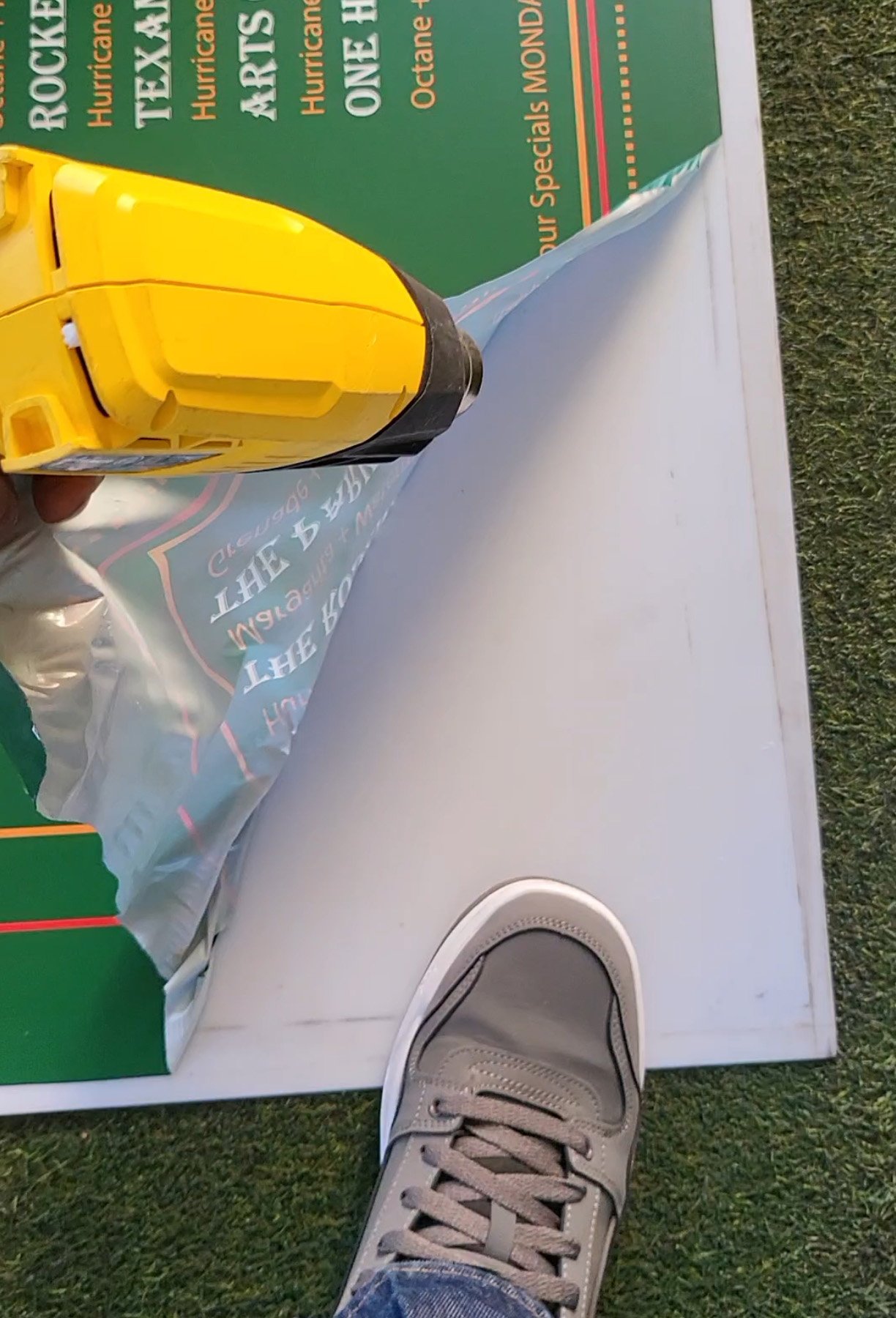 Precision Heat Application for Custom Vinyl Decal removal and Install – Commercial Sign Installers in Houston, TX