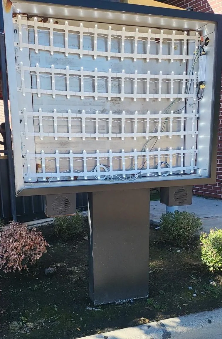 Custom Outdoor Commercial Signage Frame Decal Installation – On-Site Sign Assembly in Houston, TX