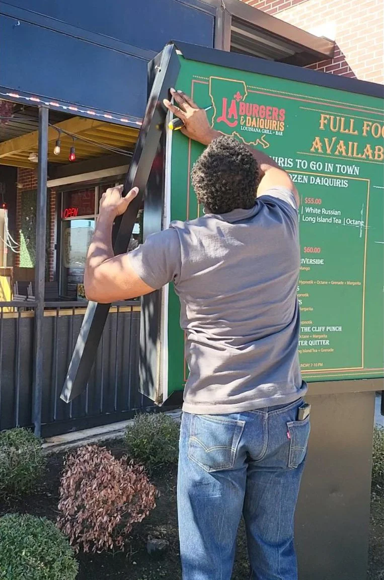 Commercial Outdoor Drive-Through Sign Decal Installation – Professional On-Site Sign Mounting in Houston, TX