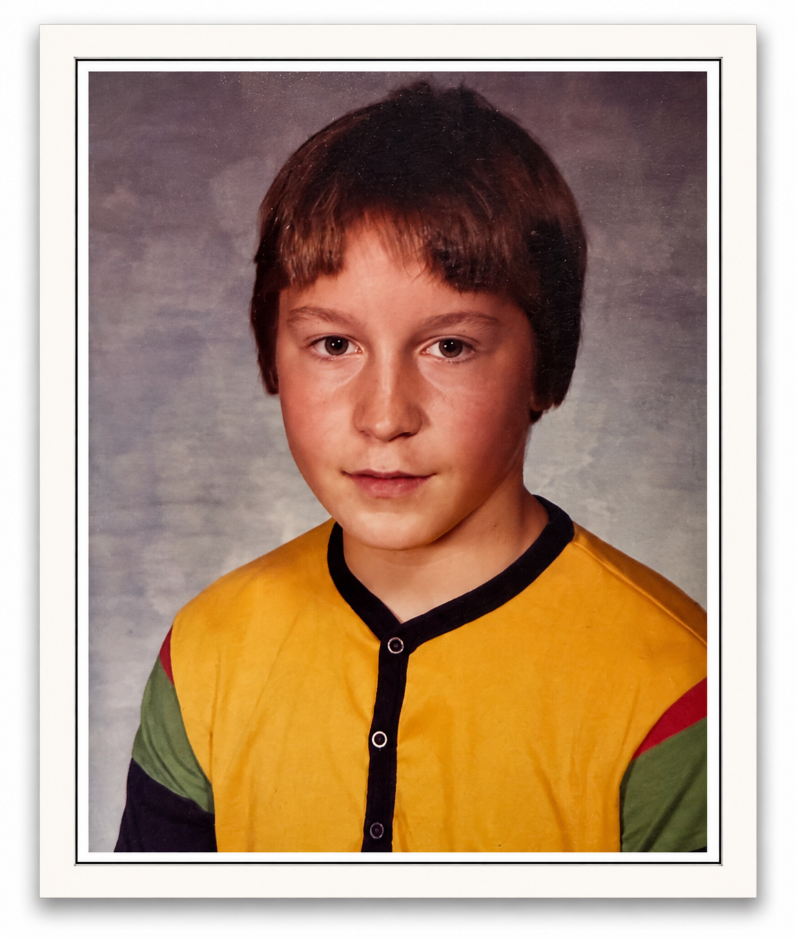 Childhood school portrait of Jeff Olson, whose life and memory inspired the founding and mission of SoWeGo.