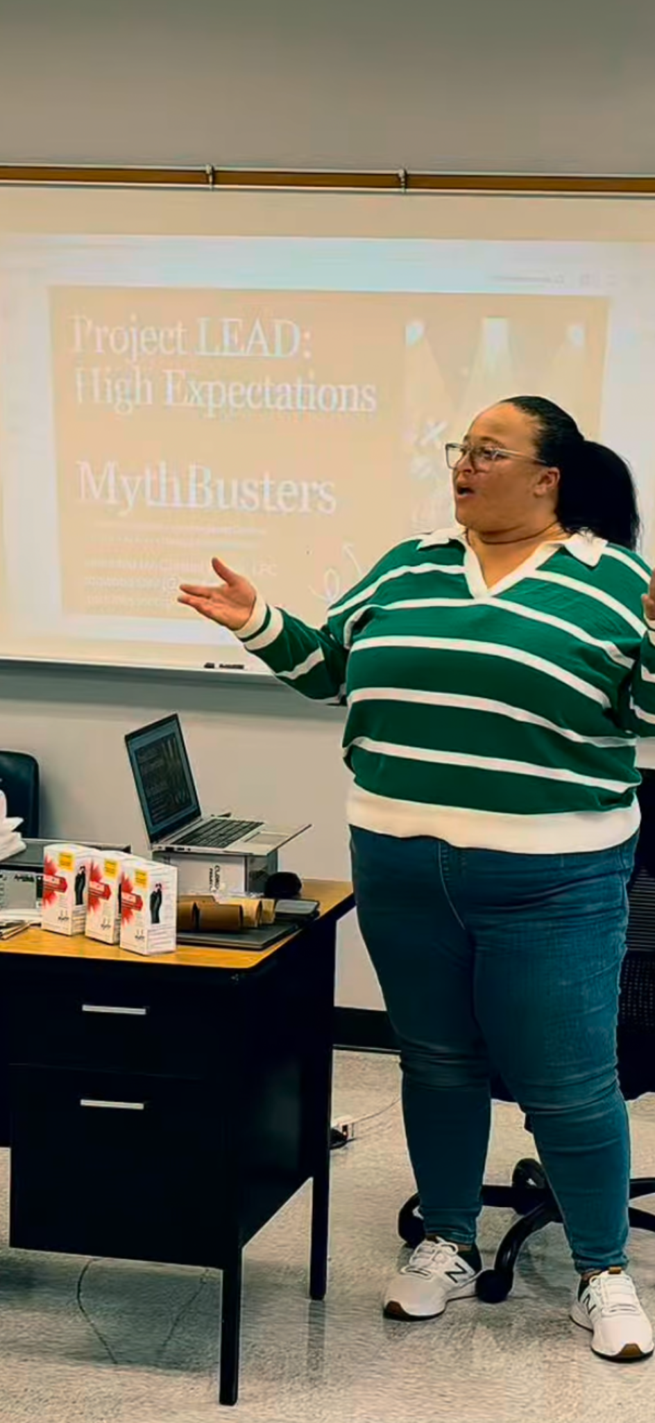 Christel Walker presenting Project LEAD High Expectations education at the college fair.