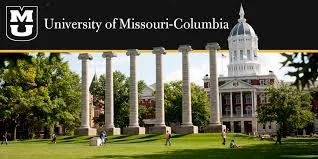 University of Missouri-Columbia campus with columns, trees, and a historic building with a dome in the background.