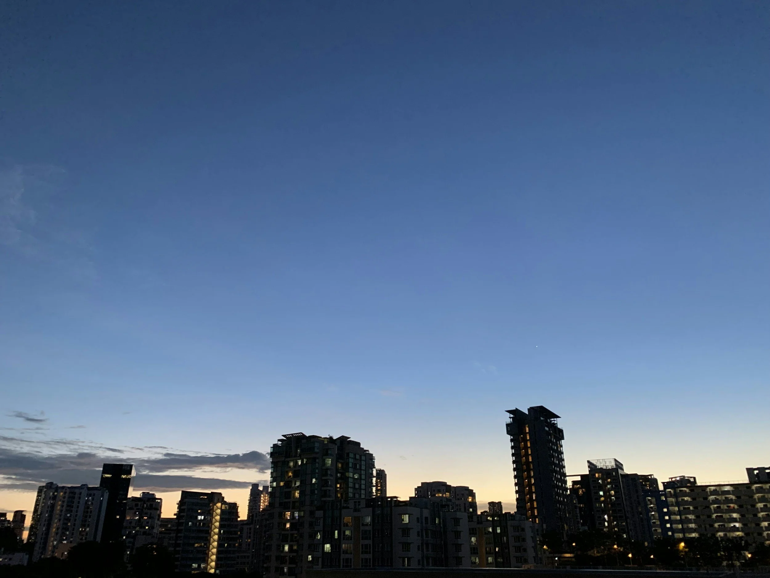 City skyline at dusk reflecting the architectural, institutional tone of Velvet Legacy Holdings LLC.