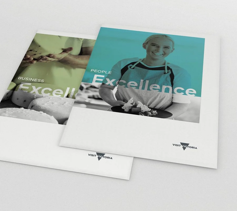 Brochures or booklets with the themes of excellence and business, featuring a smiling woman in an apron holding a plate of food, and another brochure with hands working with dough.