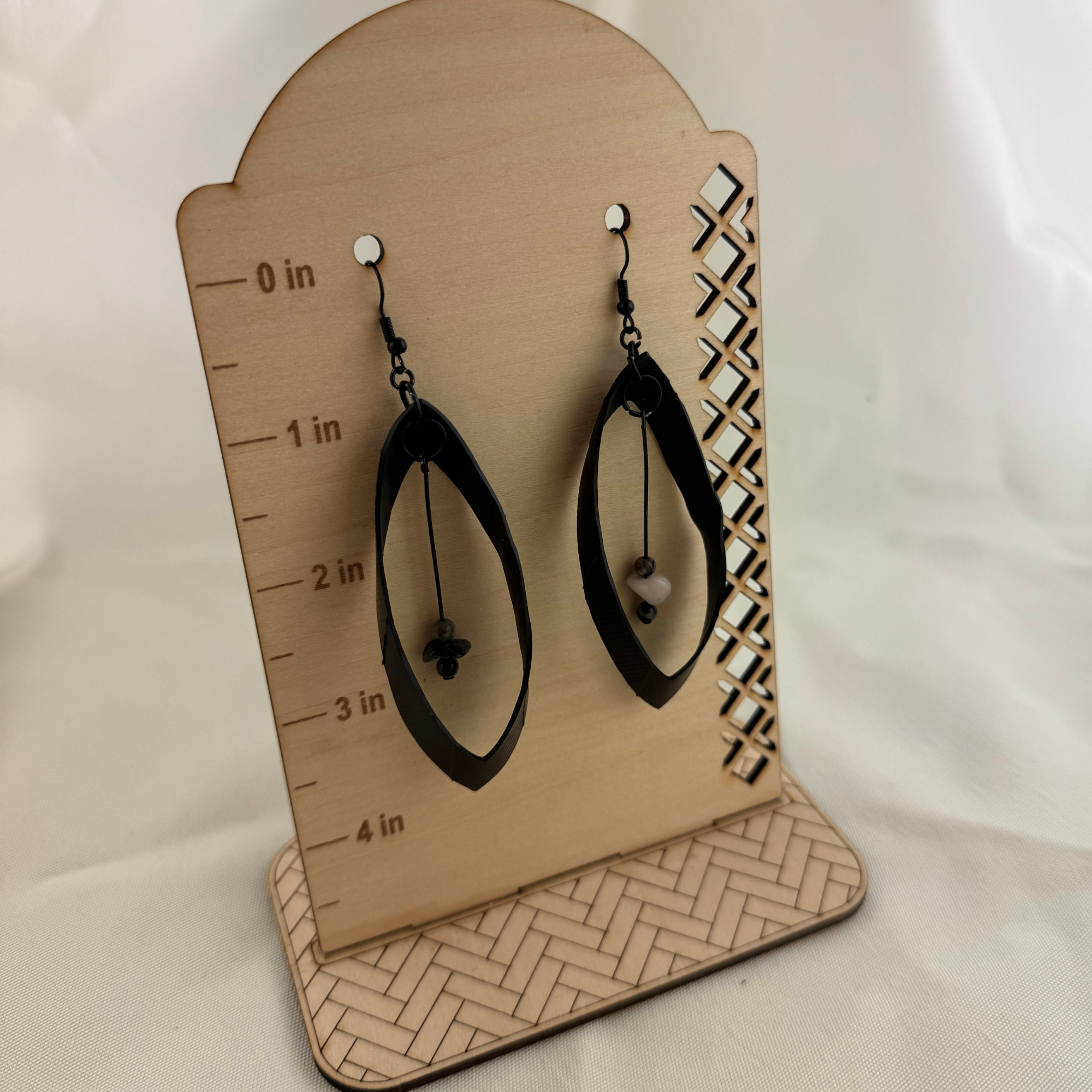 Open Teardrop Up-cycled Bike Tube with Zebra Stone Beads Earrings.png