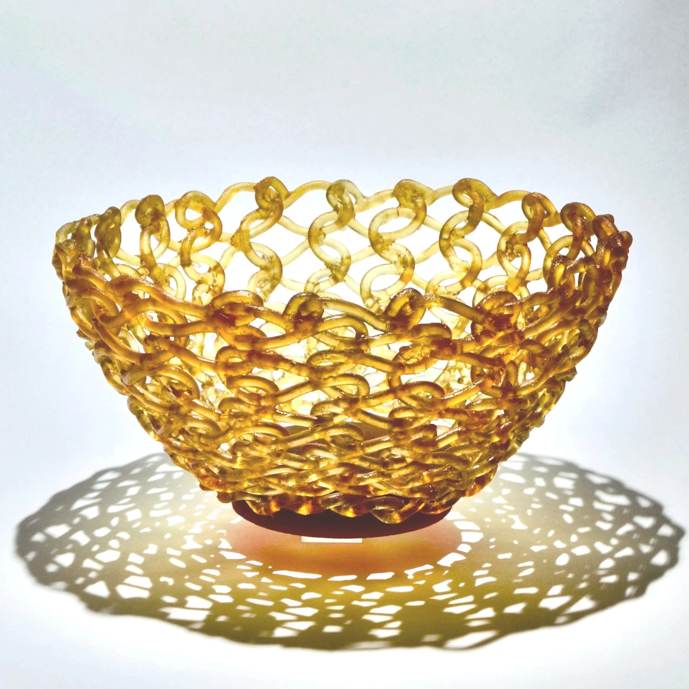 jo-anne-maire-knitted-bowl-amber-sculpture.jpeg