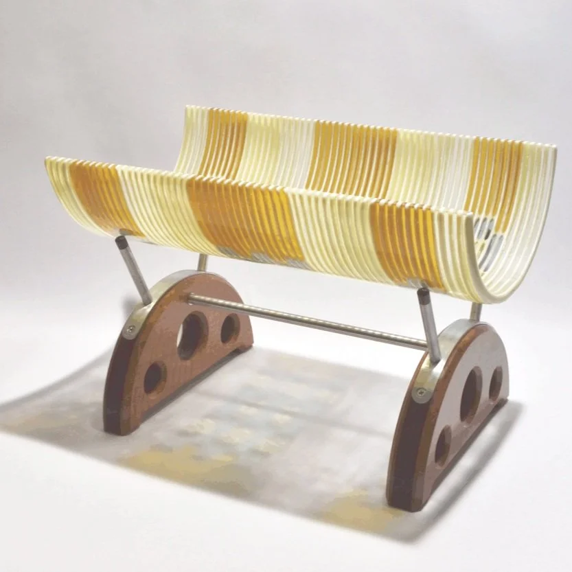 Winter Harvest - amber and french vanilla glass fused and draped, supported by wood and metal stand.
