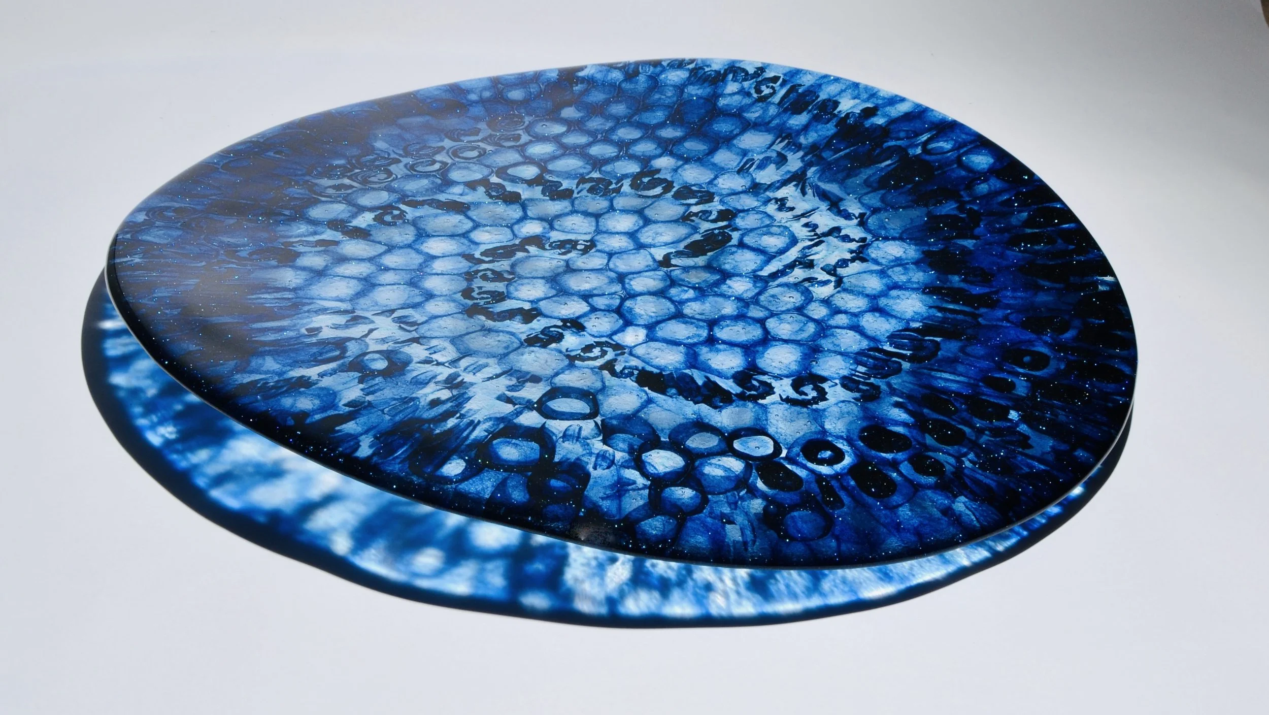 Cosmos - large curved glass platter made of hand pulled aventurine blue murrine fused and slumped.