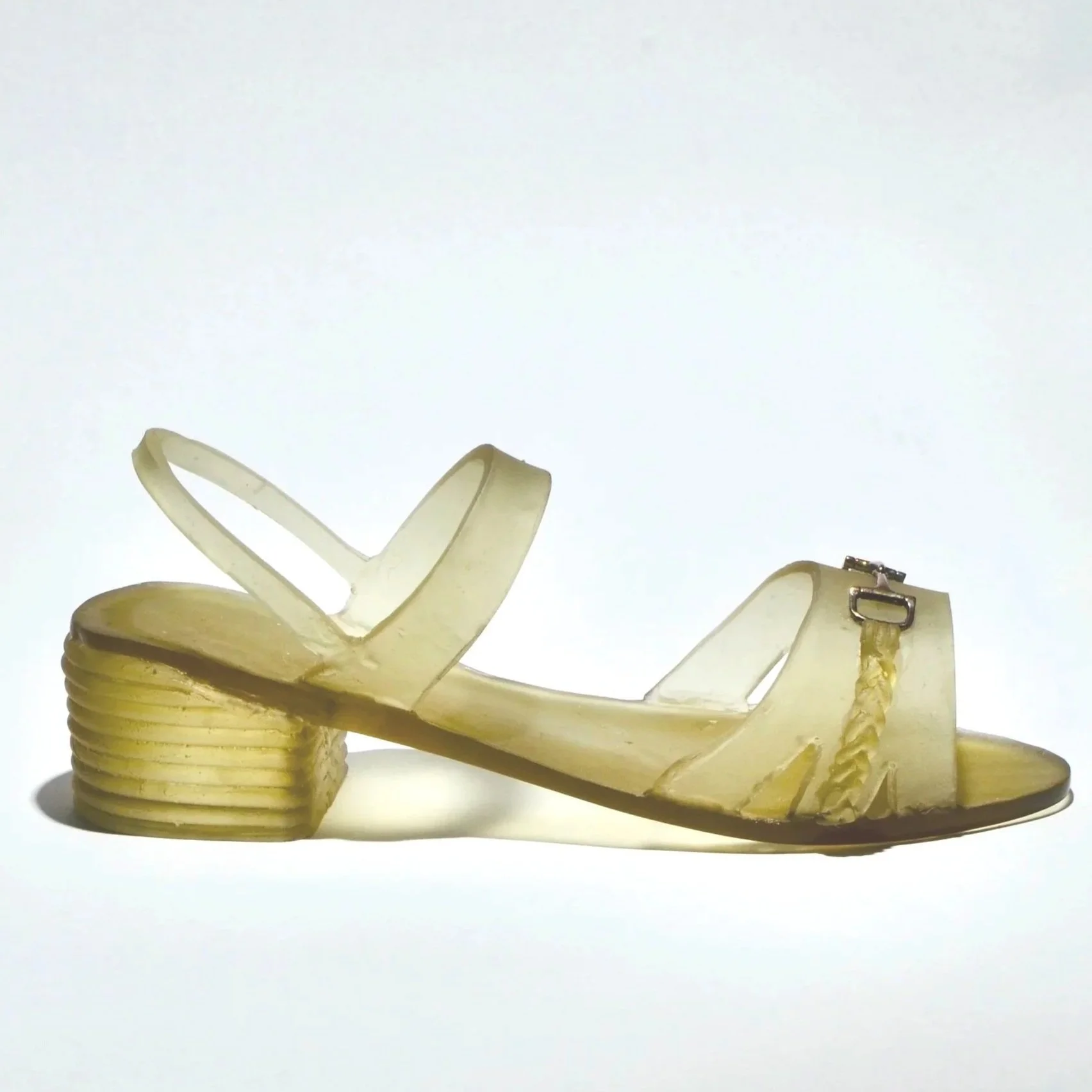 Kiln cast sandal with sterling silver snaffle bit embellishment.