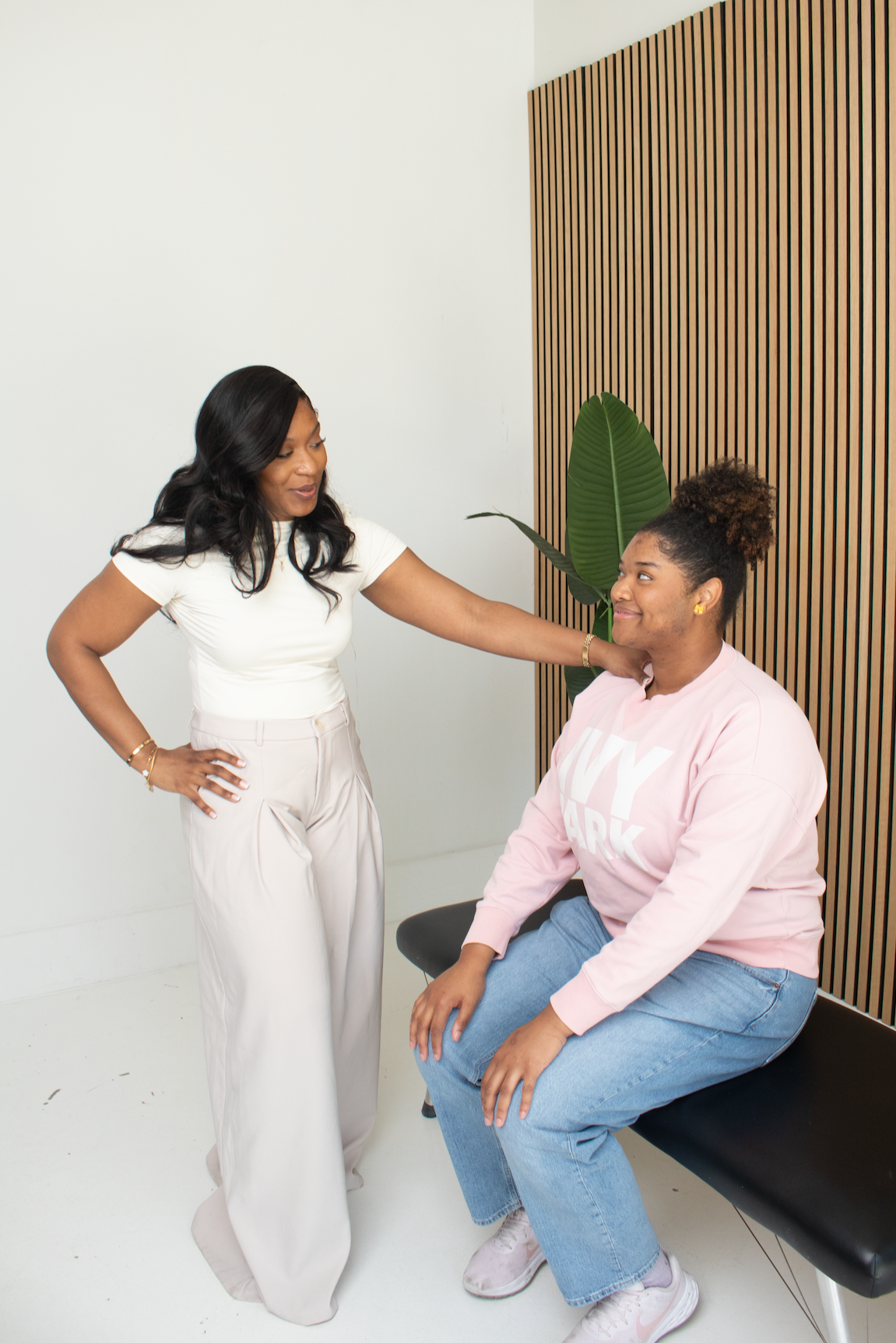 Professional brand photography by Walker Creative Solutions for Avora Chiropractic showing a high-trust patient-provider interaction in a modern clinical setting.