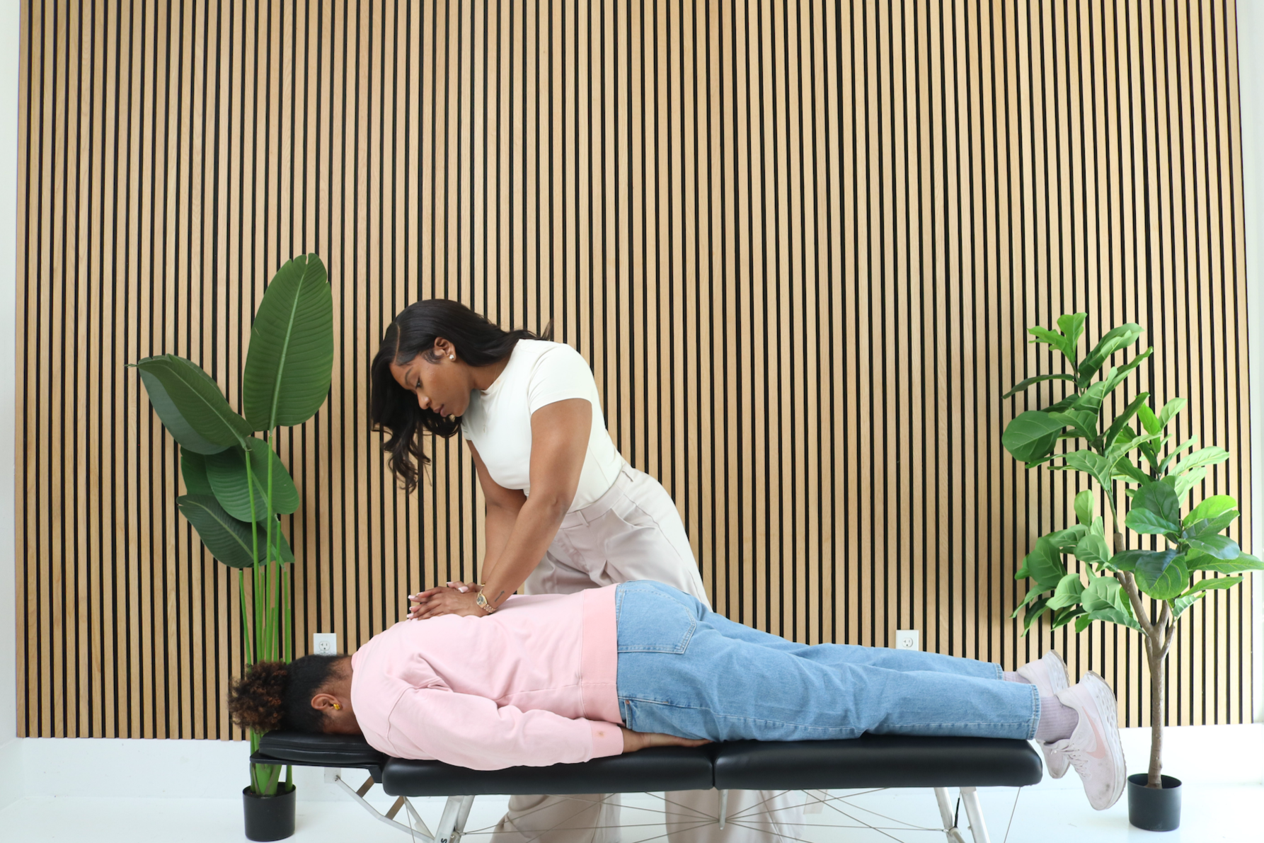 Action-oriented brand photography for Avora Chiropractic, demonstrating expert care through Walker Creative Solutions' strategic visual storytelling.