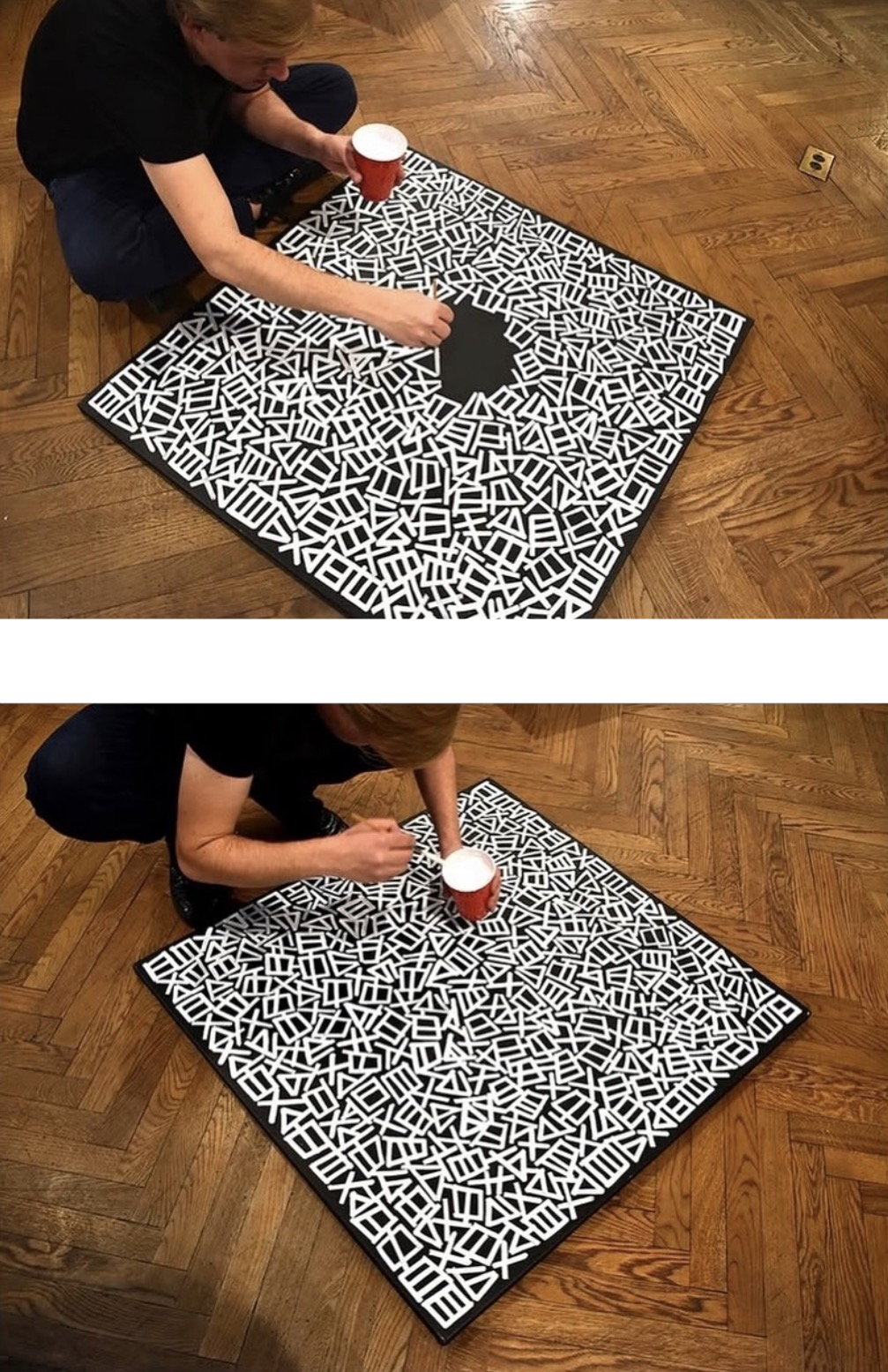 Ordered Chaos glyph painting in progress — large-scale black and white abstract work on wooden floor during solo show in New York.
