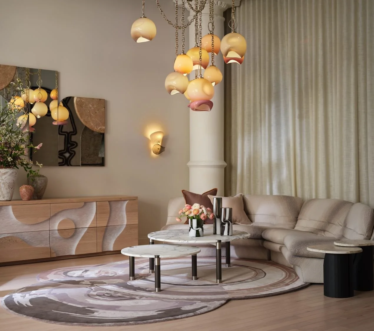 Another view from the newly opening Untold Editions with photography by @joeinstakramm  Lighting: @avram_rusu_studio  Rug by Avram Rusu for @artandloom  Tables by Avram Rusu Studio.  Cabinet by @caseyjohnsonstudio  Mirror part of @untold.editions in 