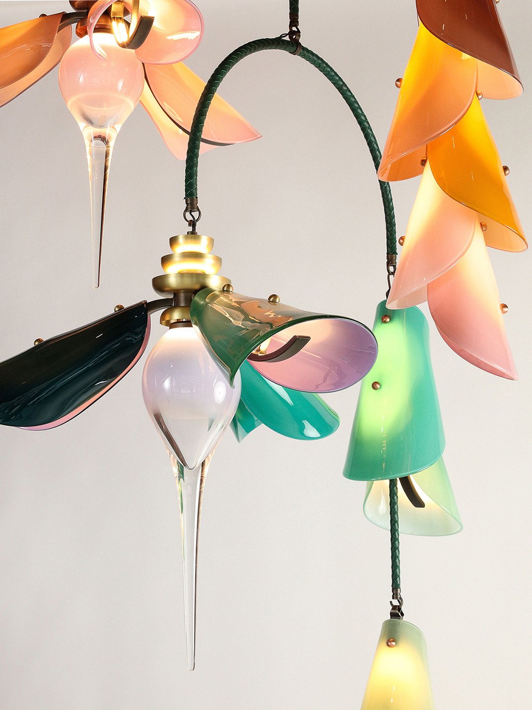 FLORA CHANDELIER.⁠
⁠
A tropical bloom, reimagined in glass. Inspired by banana flowers and Lisbon&rsquo;s famed botanical gardens, the Flora Chandelier by Avram Rusu Studio unfolds as a vertical composition of glowing pods, layered petals, and interl
