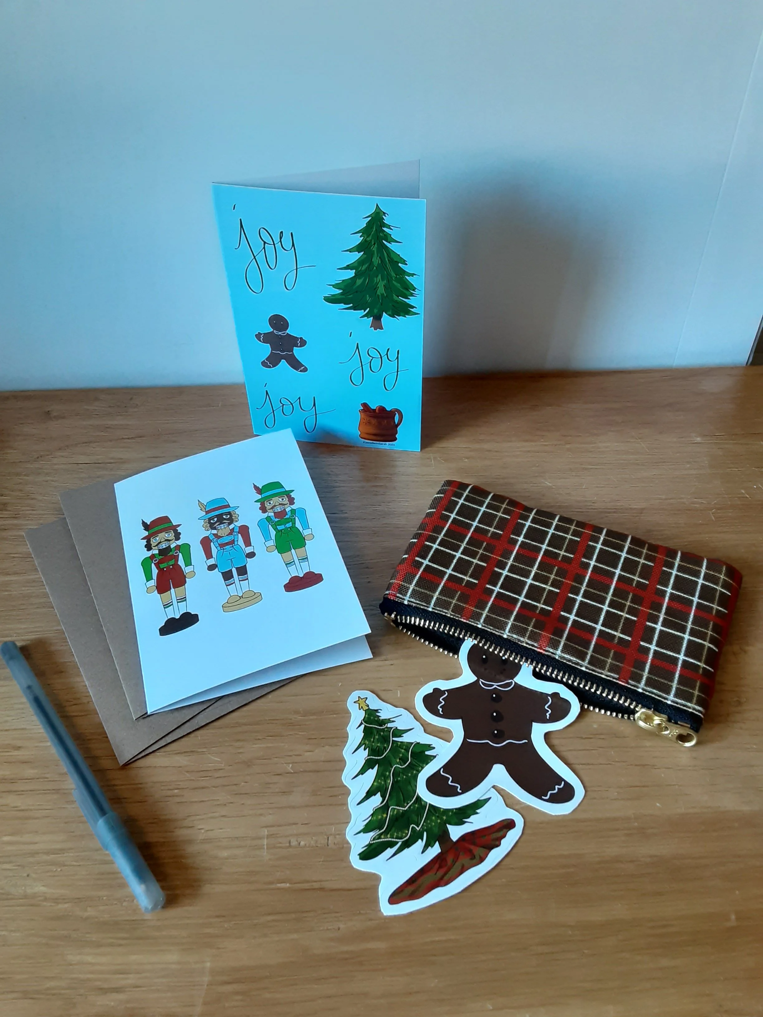 christmas holiday surface pattern design product shot - greeting card, sticker, zipper pouch