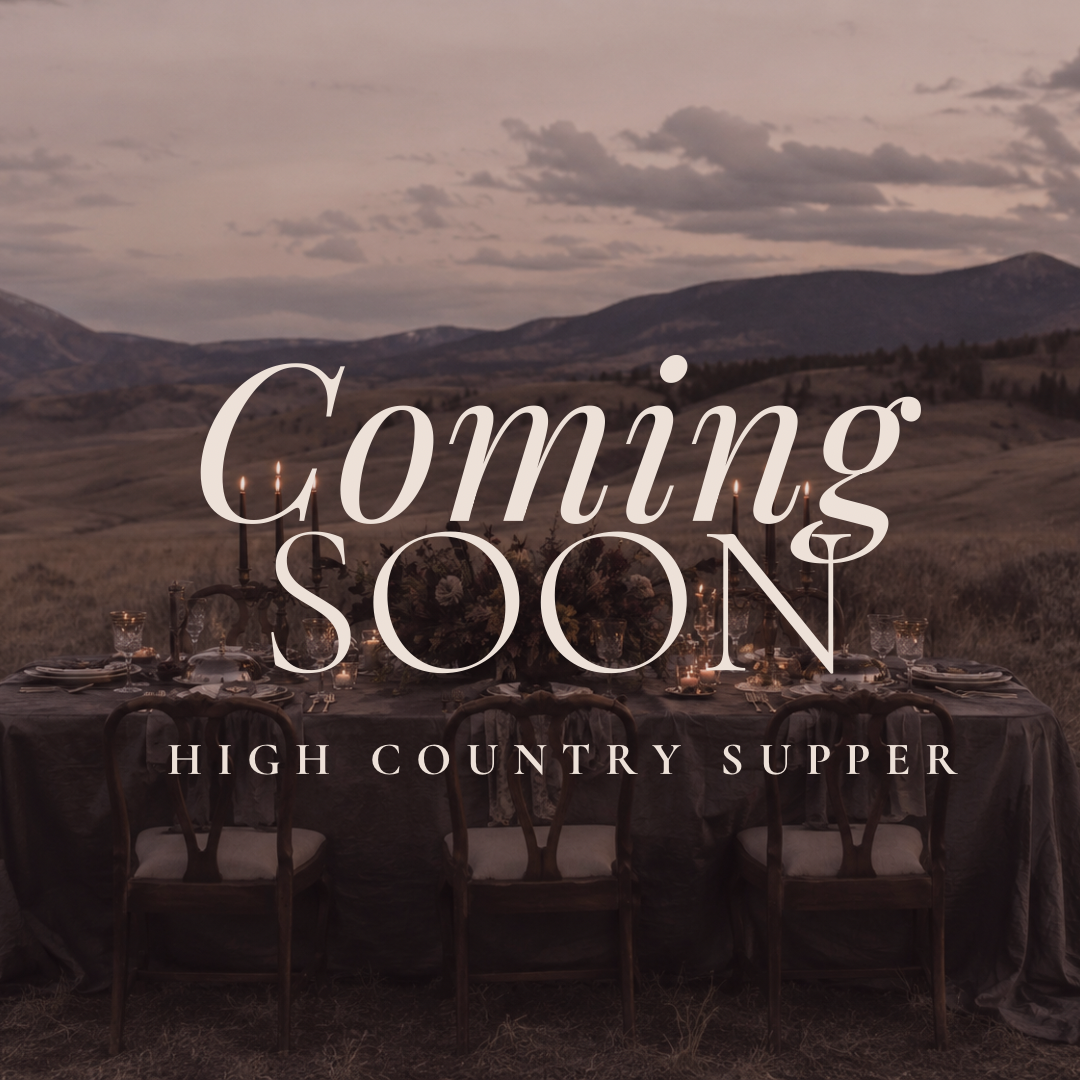 Decorative image with a sign stating 'Coming Soon: High Country Supper' in front of a antique bookshelf, surrounded by plants and vintage decor.