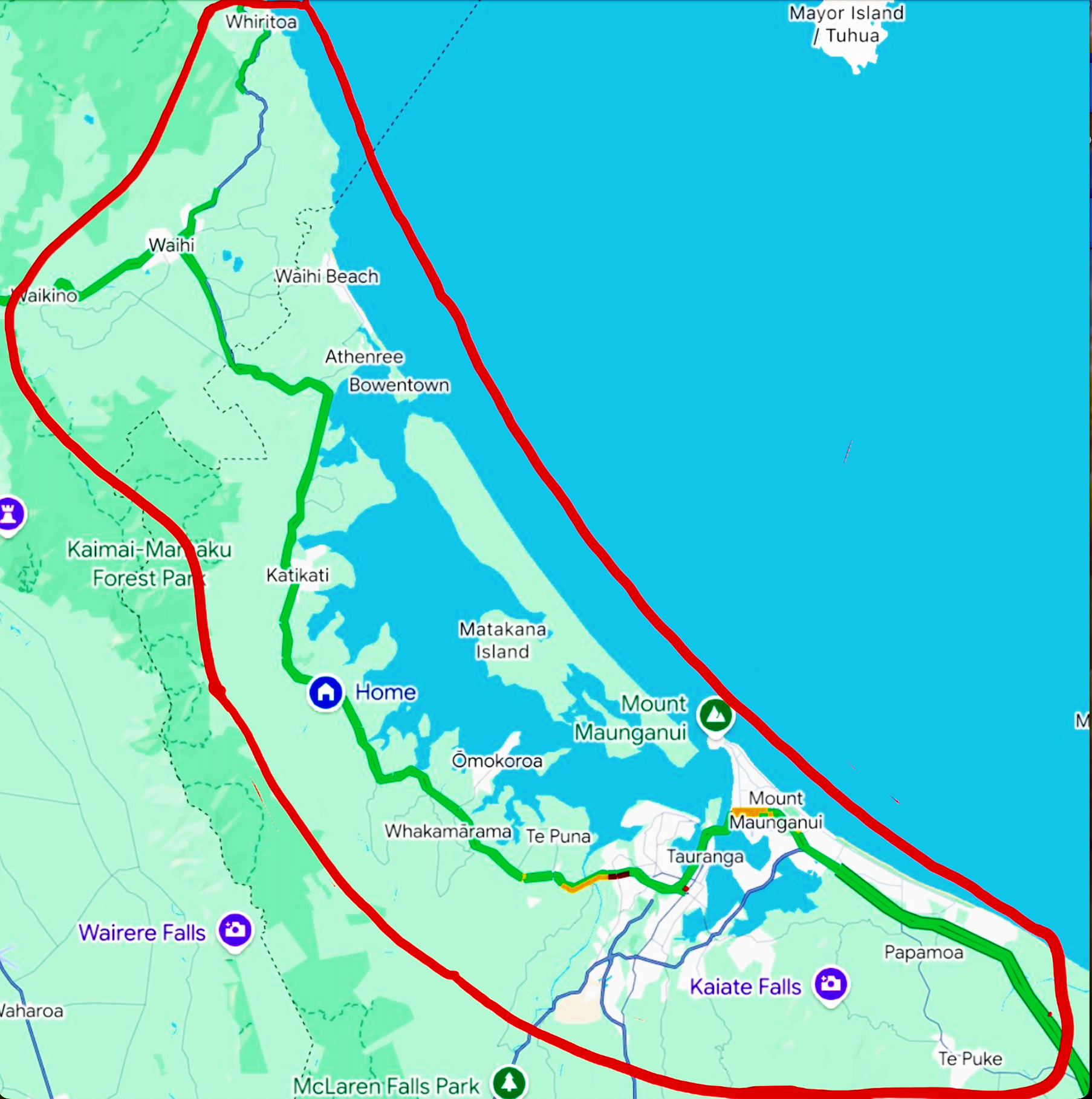 Map of a coastal area red lines indicating the boundary AraMahi Projects work in,  including landmarks such as Mount Maunganui, Te Puna, and Waihi Beach.