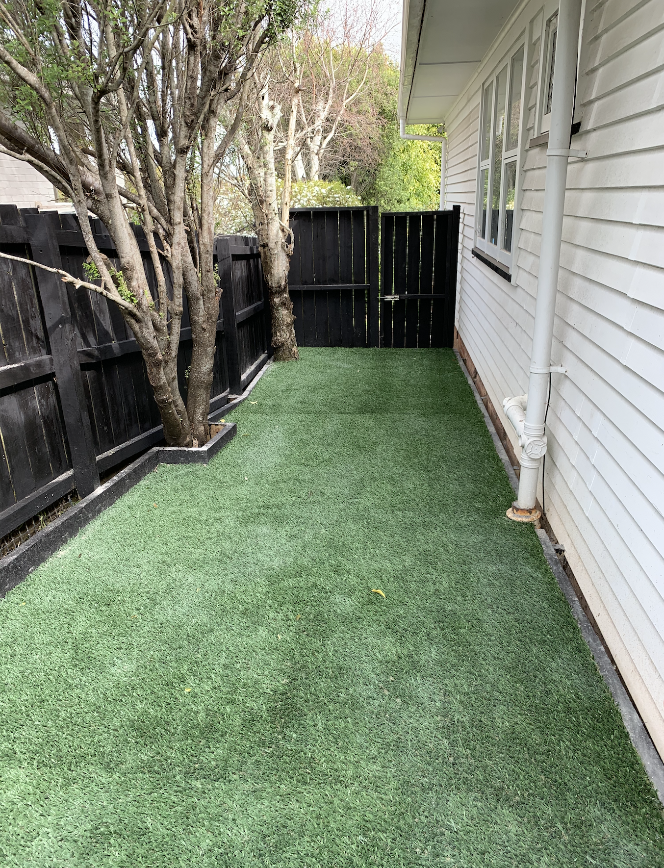 Muddy side alley to children's safe year round play area