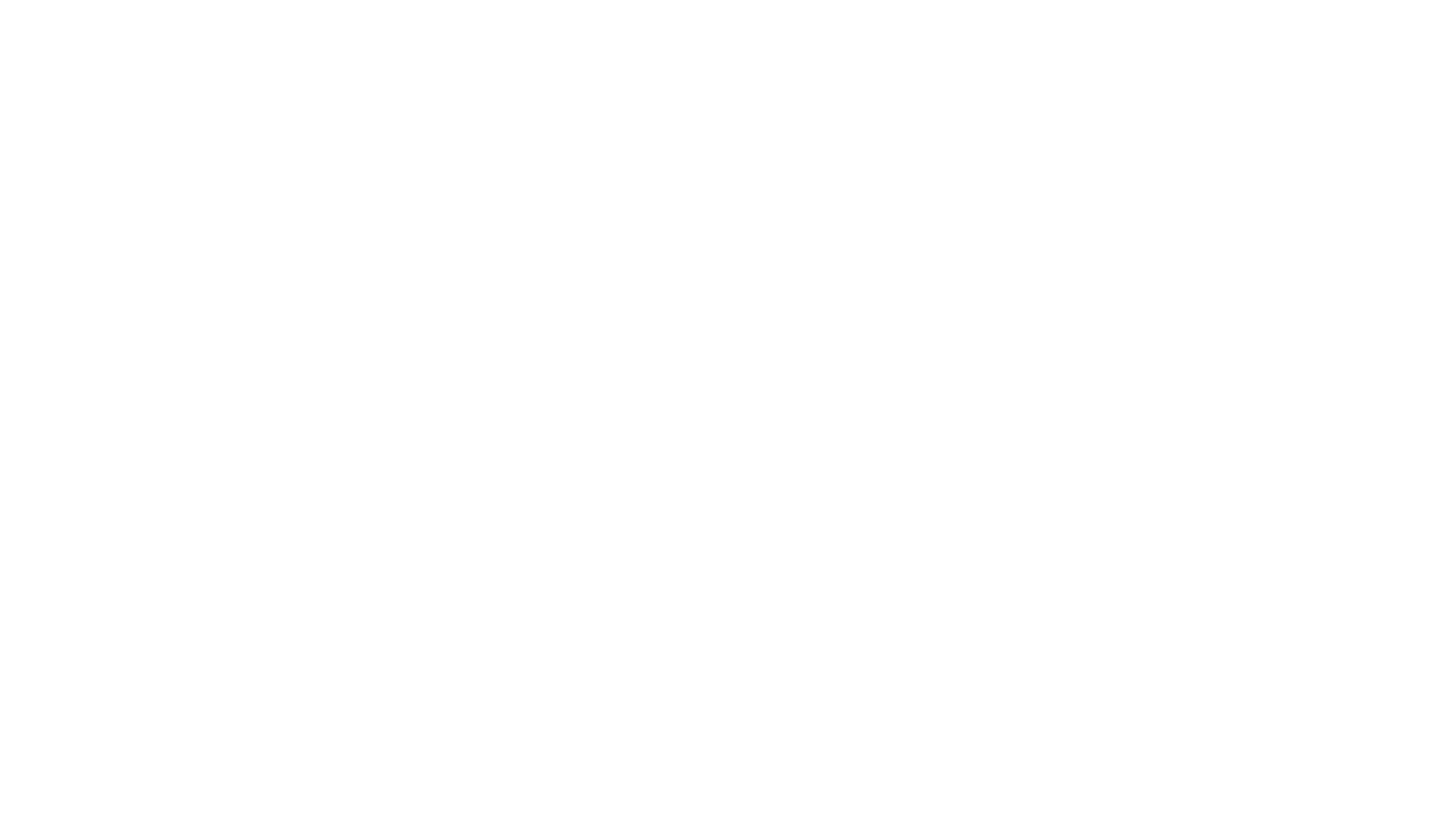 Black and white logo of a stylized smiling face with round eyes and a curved mouth, surrounded by a gear shape.