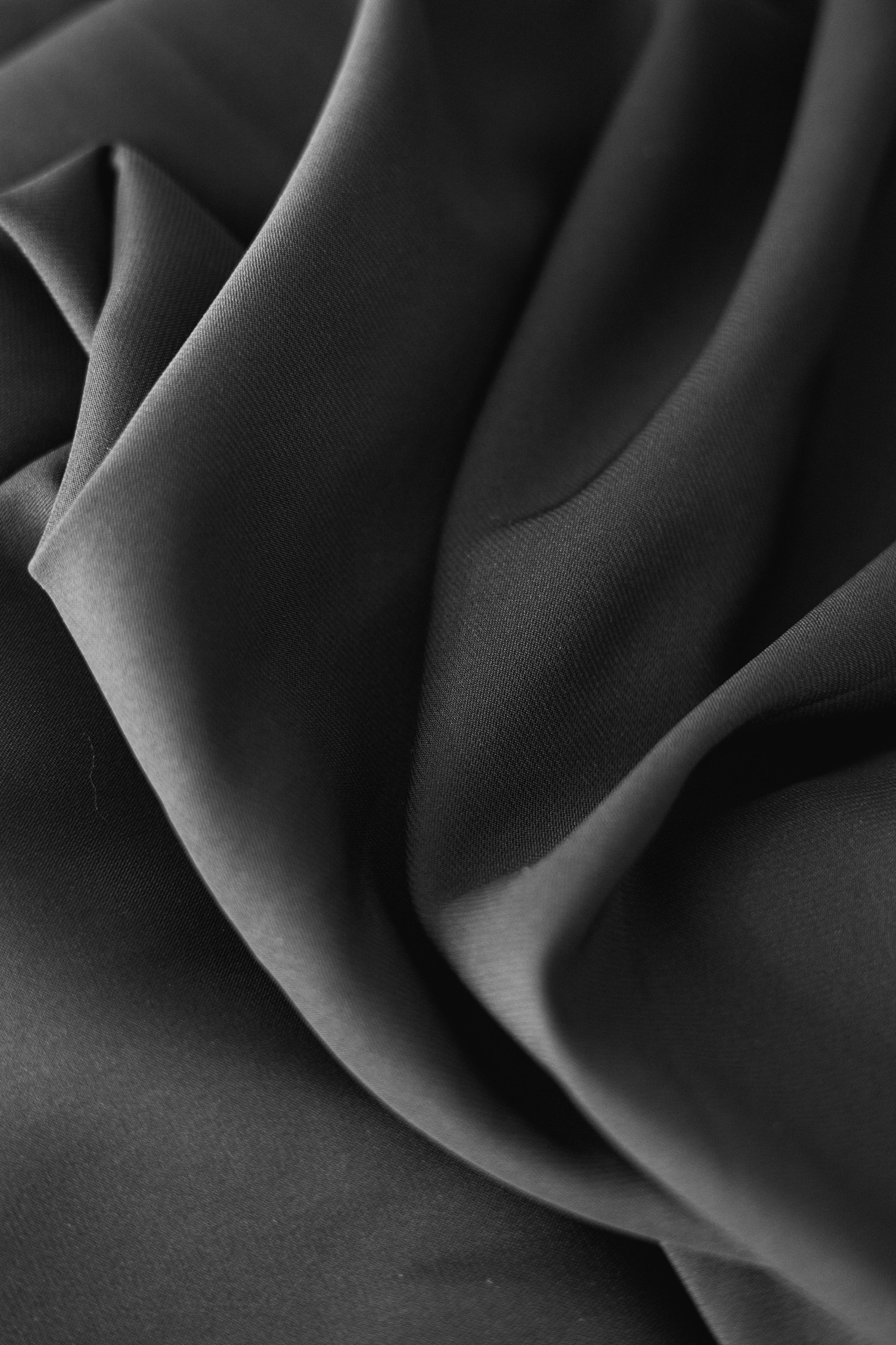 Rolls of matte black fabric