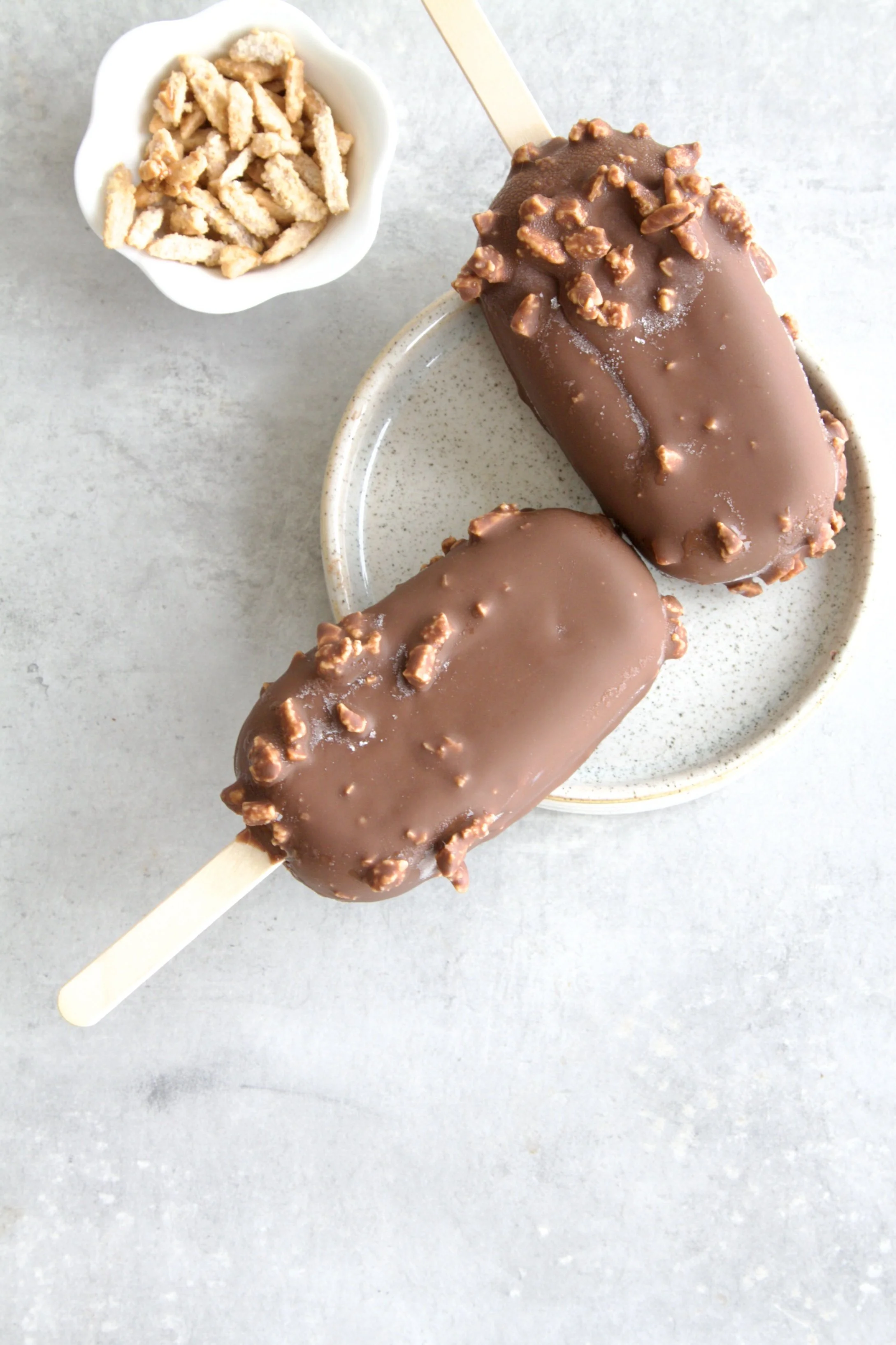 magnus style ice cream popsicles with an almond chocolate coating