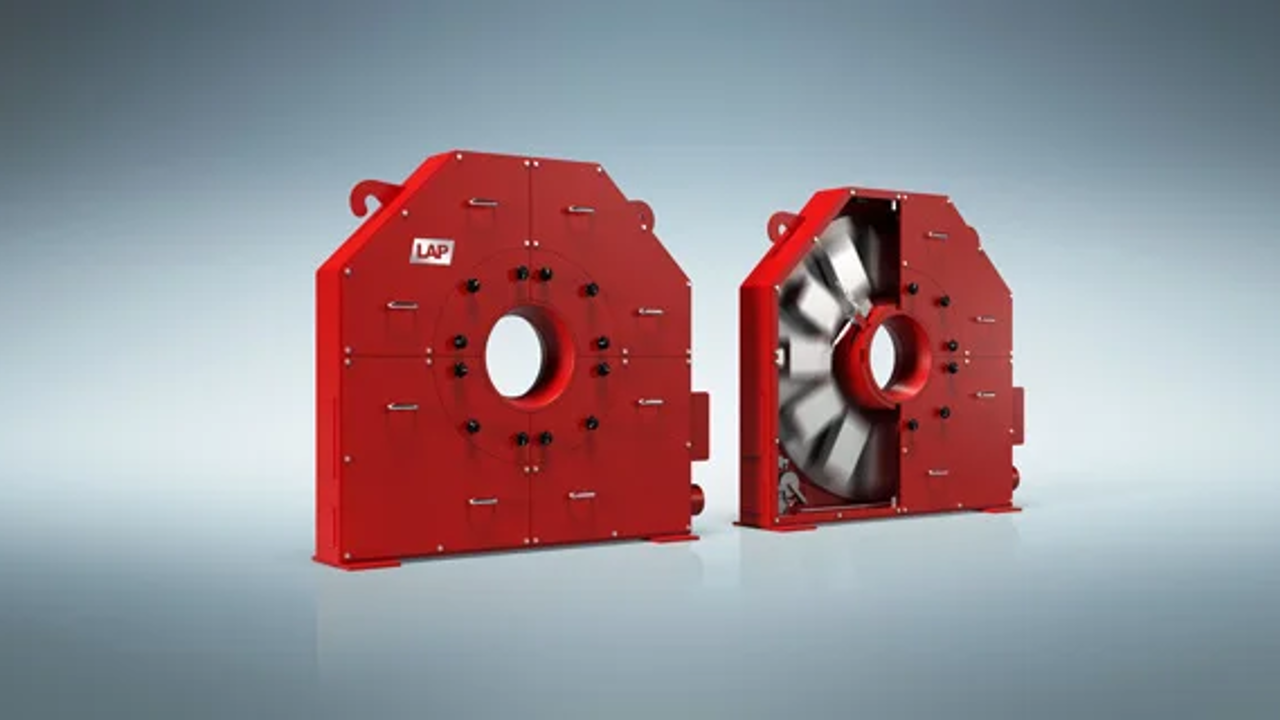 Two red fire pump modules with a large turbine inside the right module, used for fire protection systems.