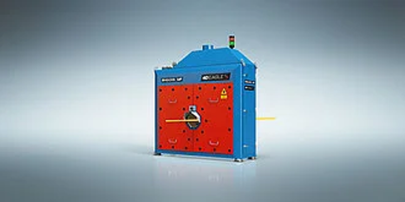 Blue and red industrial machine with a safety warning label and a rotating arm in front of a plain background.