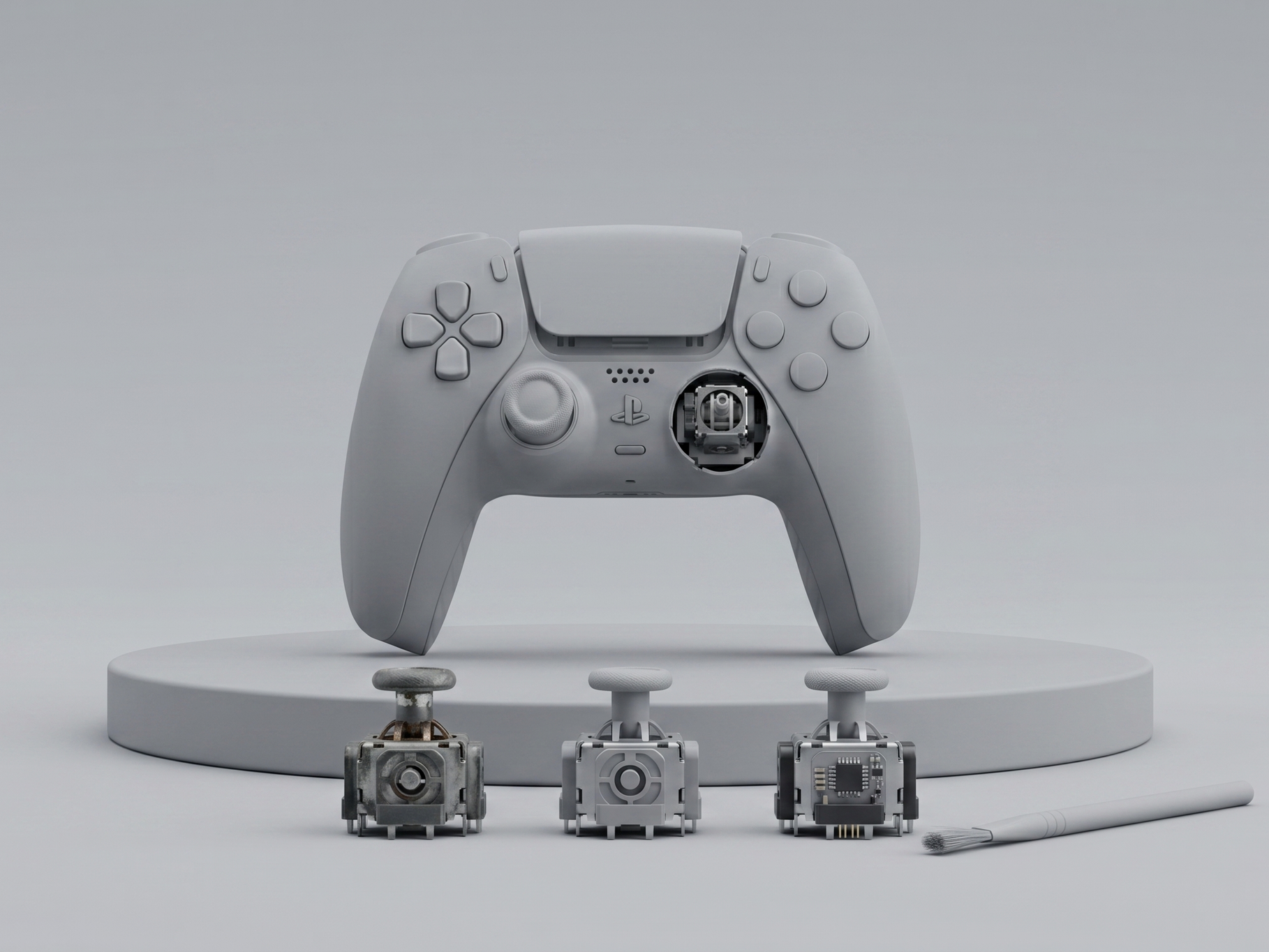 Ein zerlegter PlayStation 5-Controller auf einem runden weißen Ständer mit verschiedenen entnommenen Komponenten vor ihm.