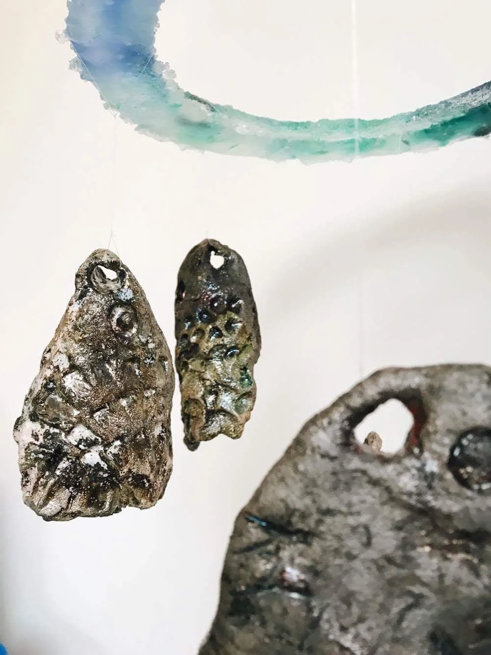 Archive, fish head mobile (ceramic raku fired and glass)