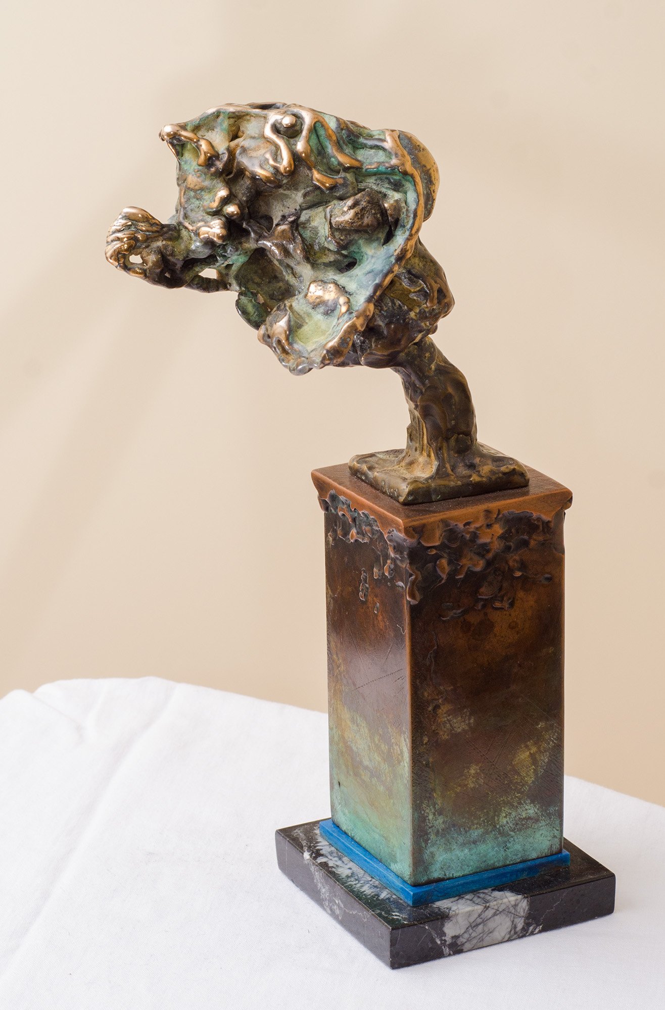 Inner Silence. 2017. Patinated bronze, copper, marble. 17 x 10 x 36 cm. Available