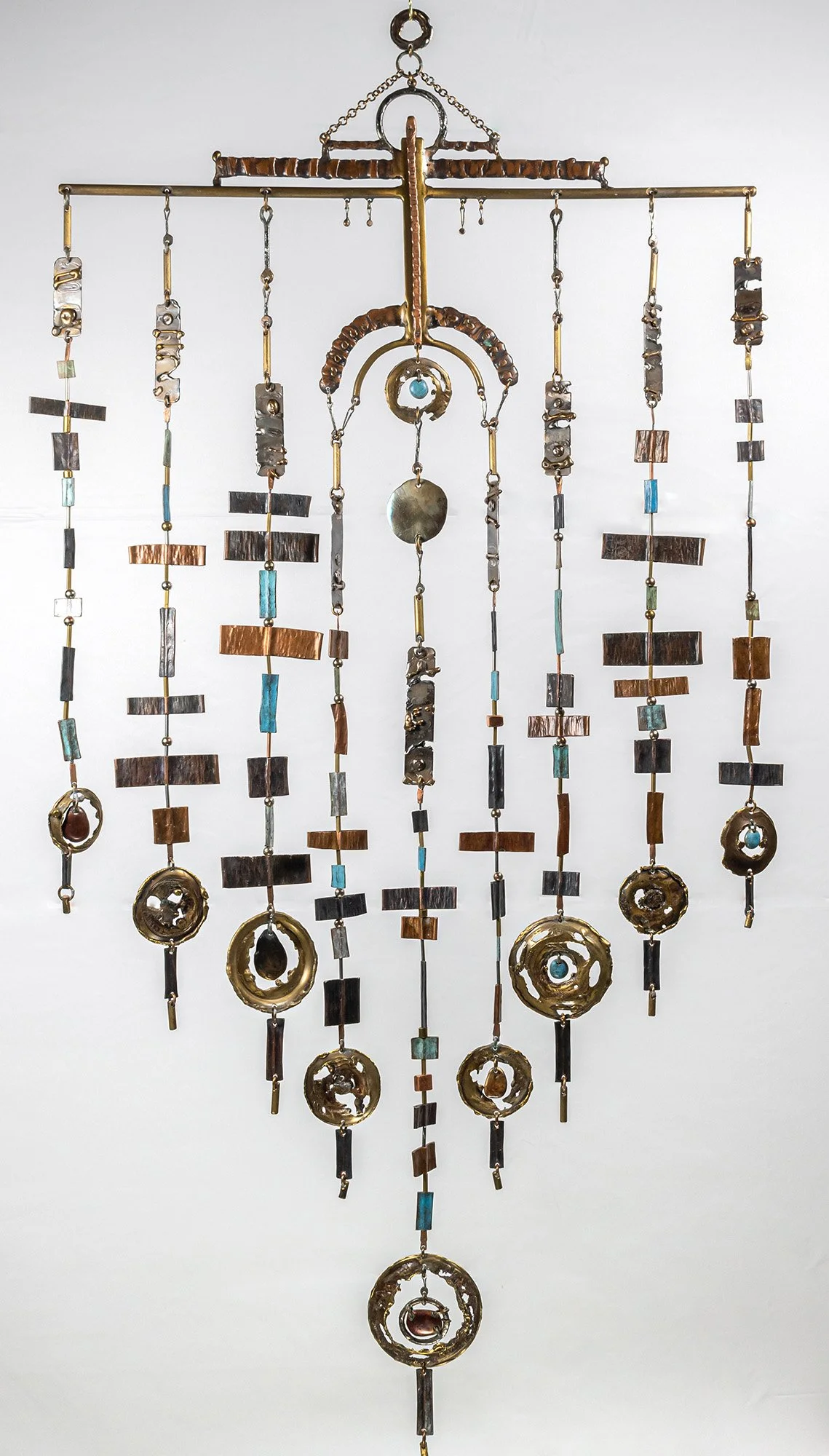 Nine Threads, 2007. Patinated bronze, brass, copper, and stainless steel. 23½ × 49 inches. Hand-fabricated, 1 of 1. Available. Price on inquiry.