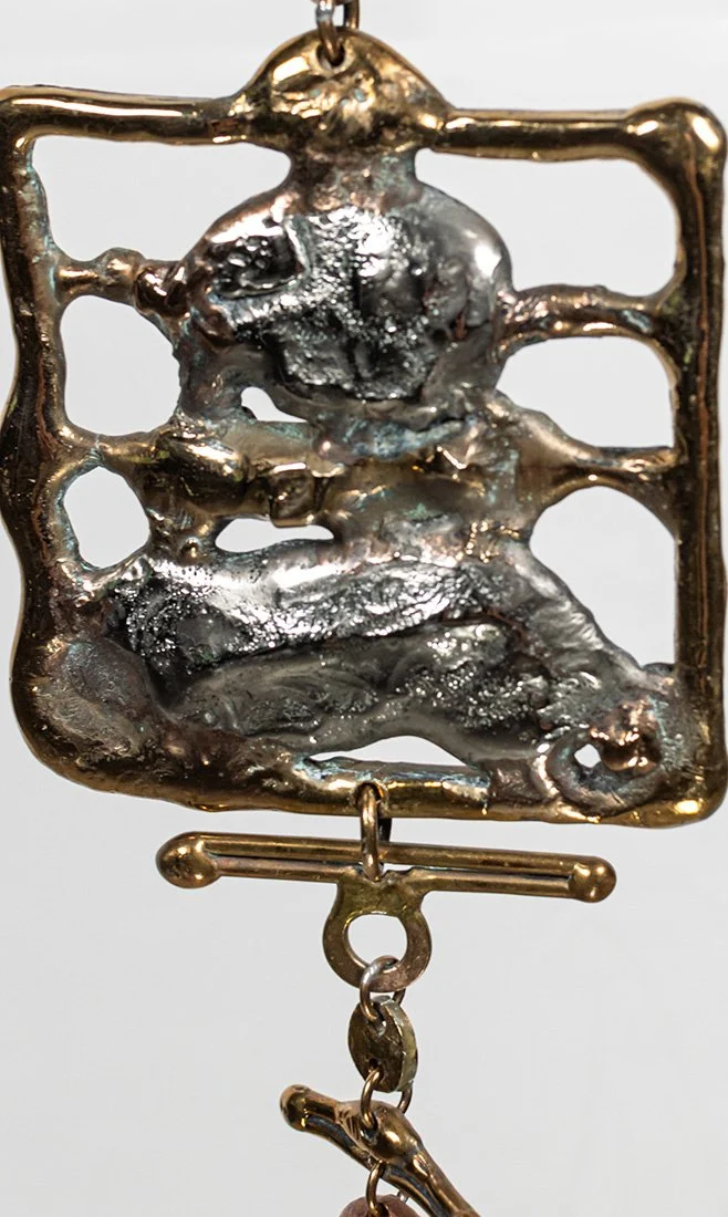 Stainless steel runs at a different temperature from everything else here. It is melted and welded rather than soldered, each element fused directly into the piece.