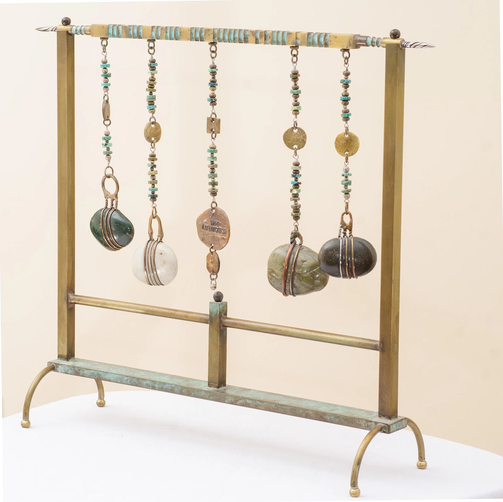 Perihelion. 2008. Brass, bronze, copper, turquoise, river stones. 46 x 41 cm. Available