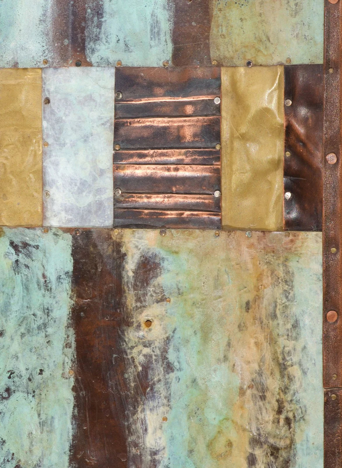 Winter.
Patinated copper, brass, and mixed metals
25 × 51 cm · 2006.
Private Collection