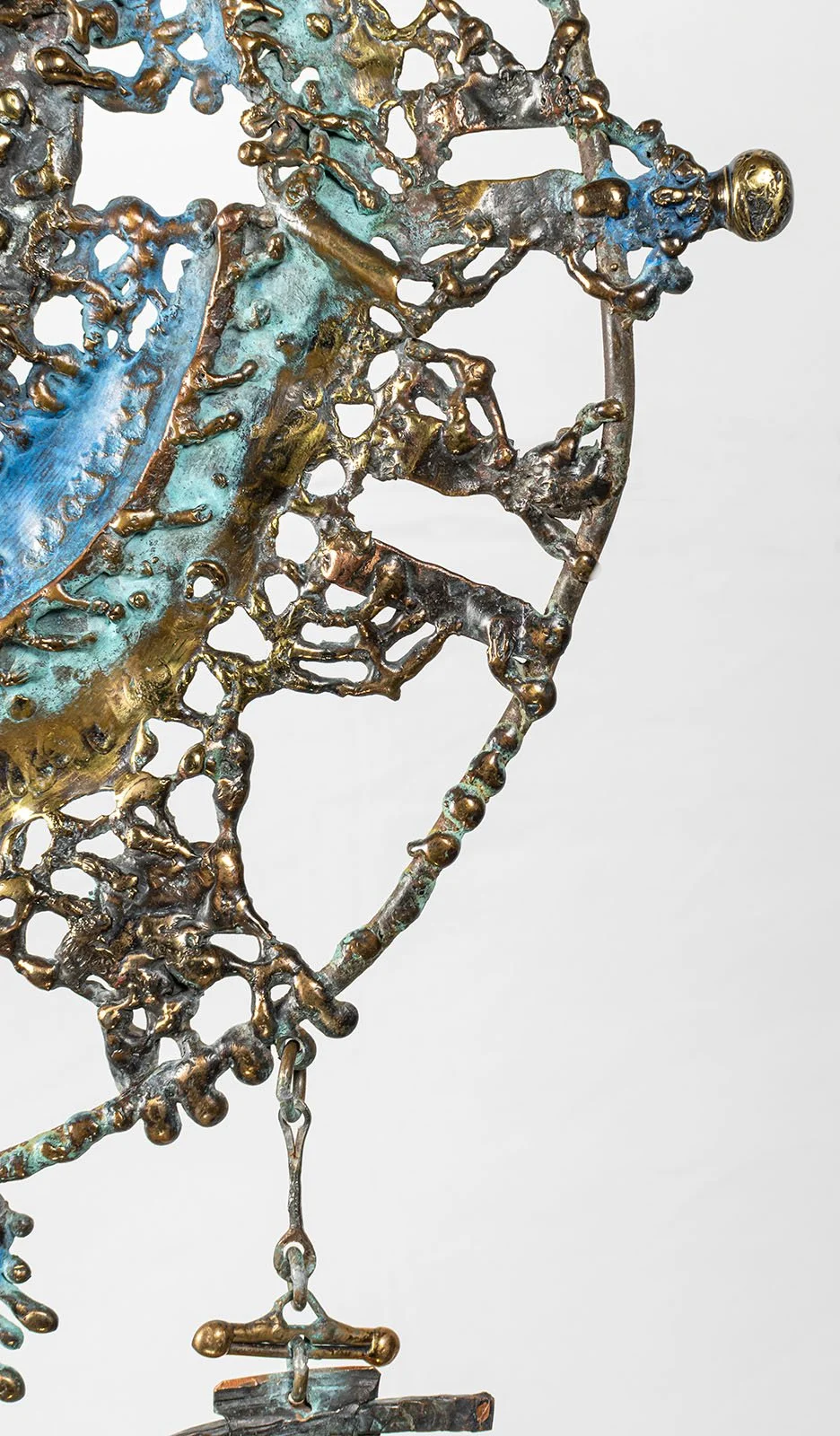 The outer edge is worked as lace: open, knotted, and built in air rather than laid on a ground. Bronze meeting bronze the way thread meets thread, by hand and flame. Nothing cast from a mould, nothing repeated.