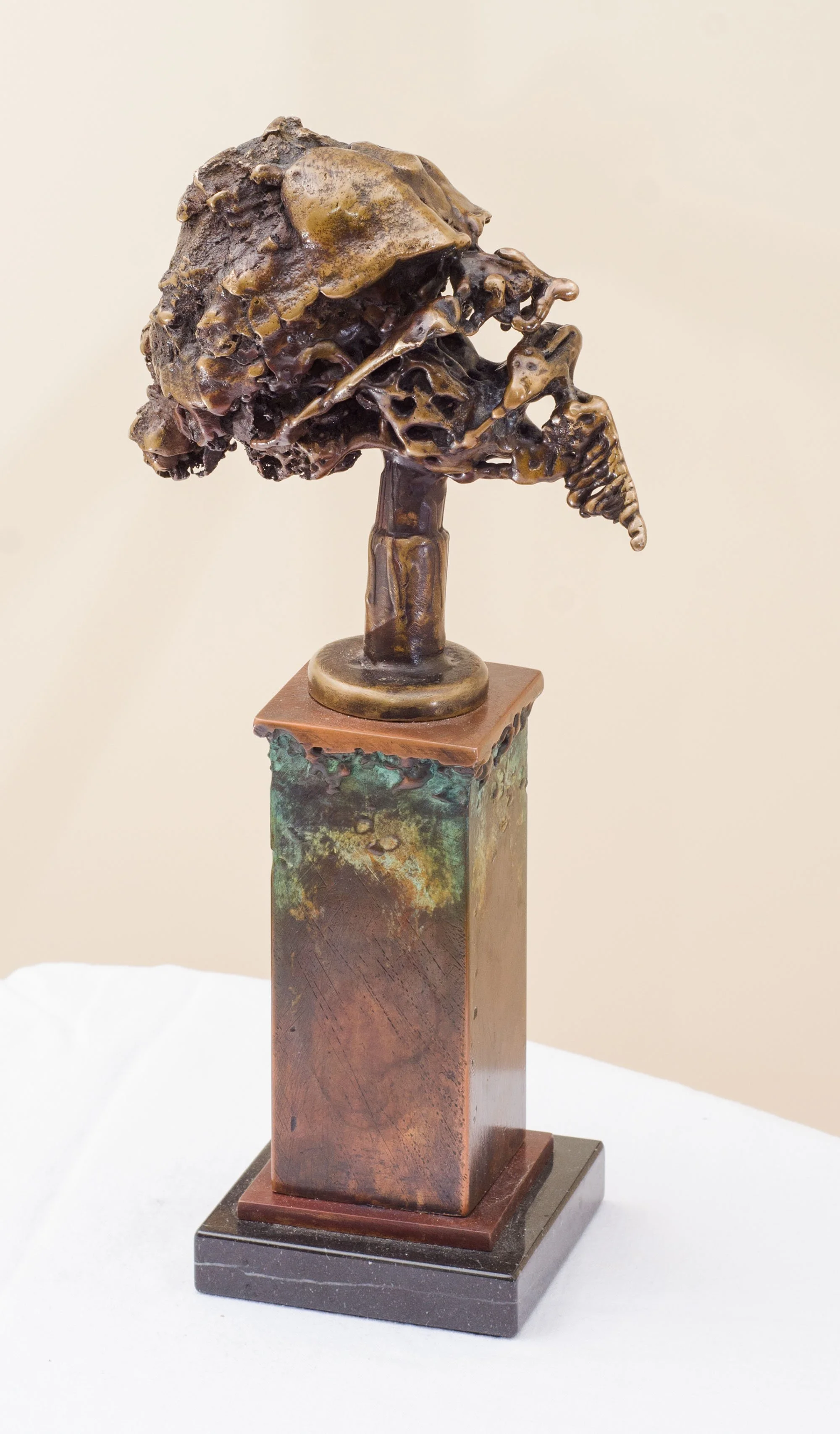 Unspoken Wisdom. 2017. Patinated bronze, copper, marble. 17 x 10 x 36 cm. Available