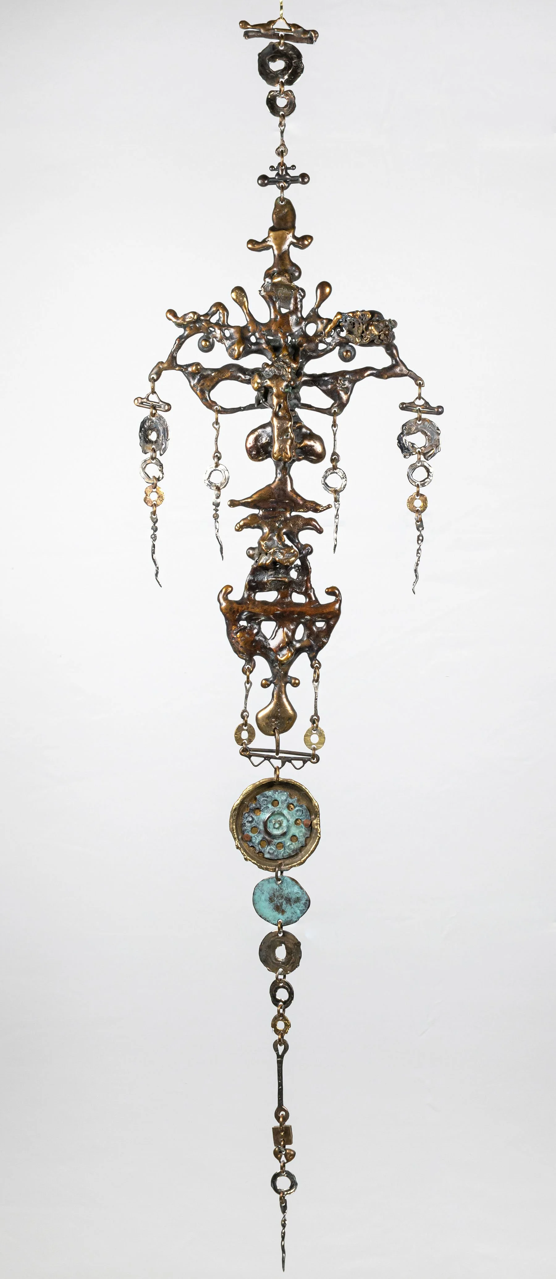 Composure III, Brown, 2007. Bronze poured directly into sand, then composed with brass, copper, and stainless steel, every element smithed and assembled by hand. 10 × 40 inches. 1 of 1. Available. Price on inquiry.