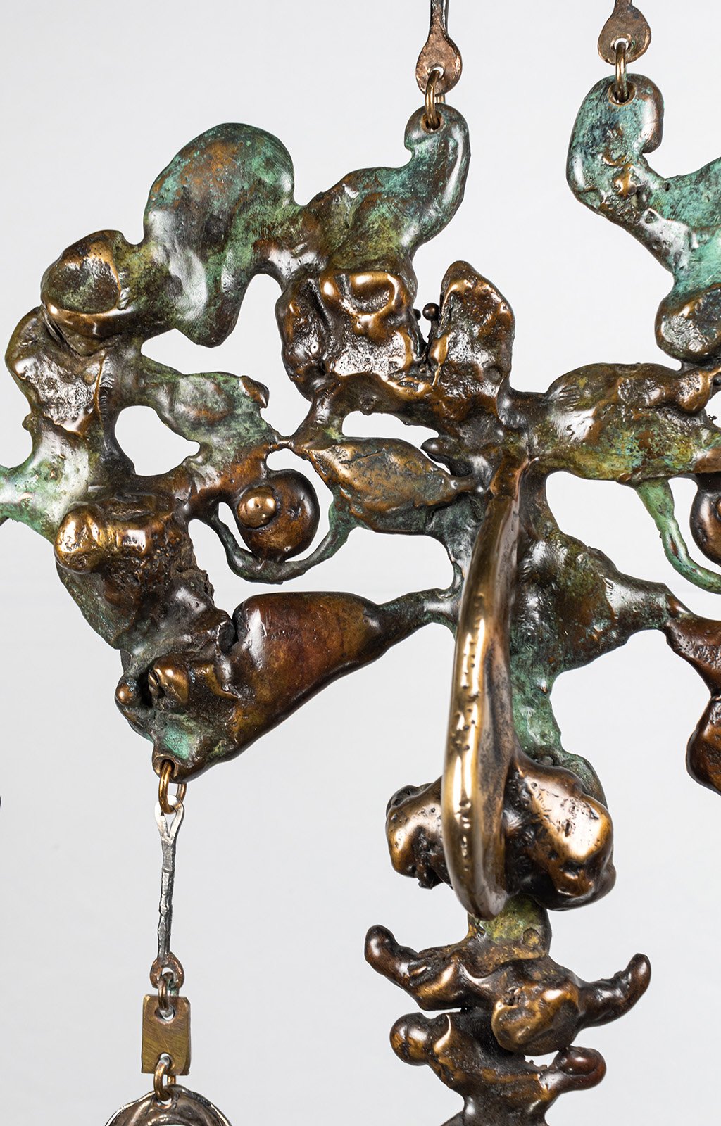 Bare bronze is left showing wherever the light should catch