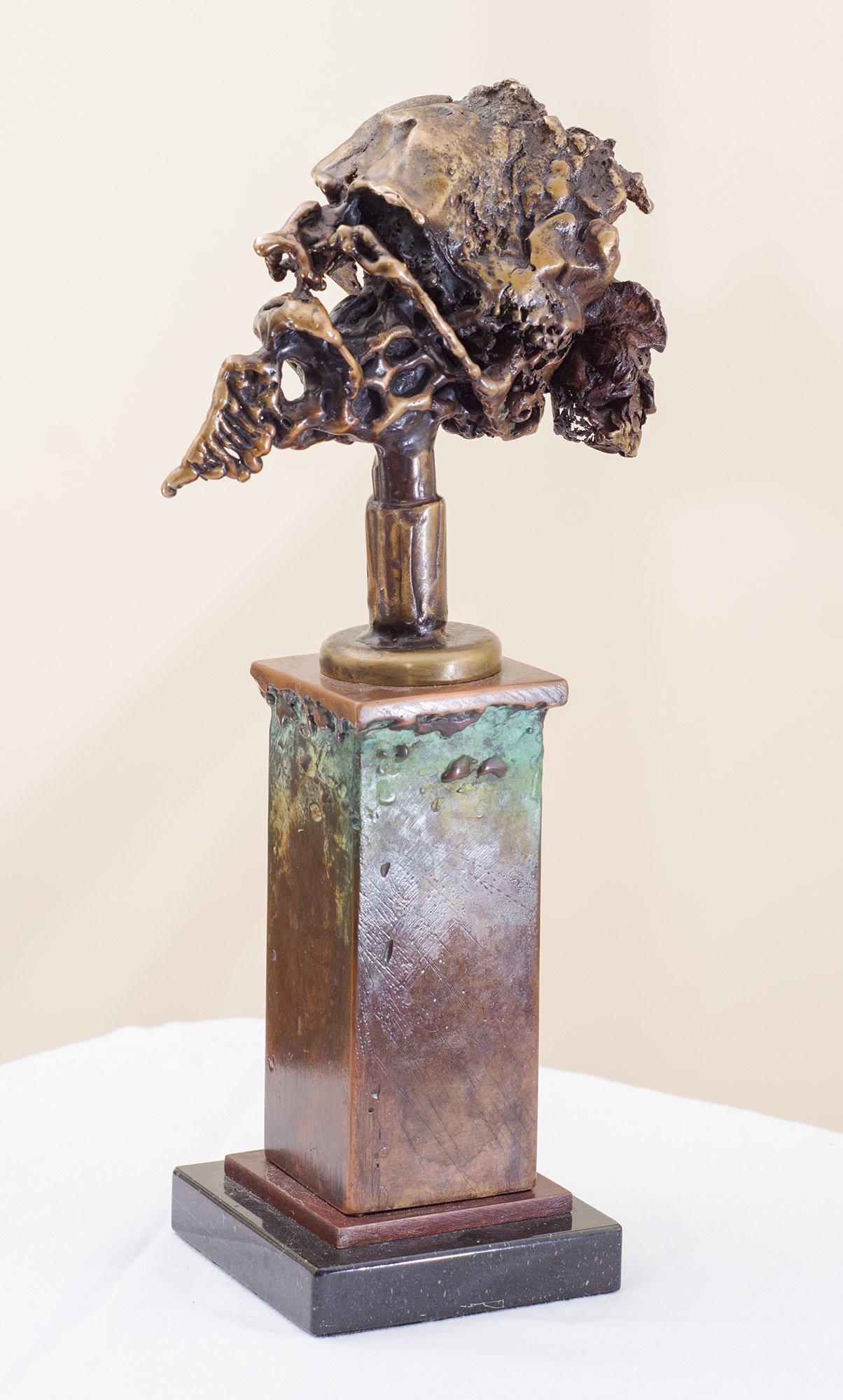 Unspoken Wisdom. 2017. Patinated bronze, copper, marble. 17 x 10 x 36 cm. Available