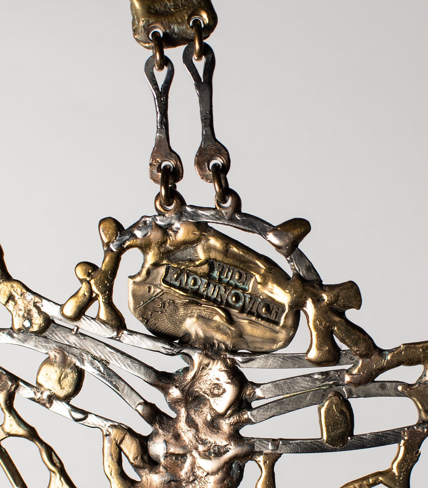 The artist's thumbprint, cast in bronze, beside the name, the year, and the mark 1 of 1.