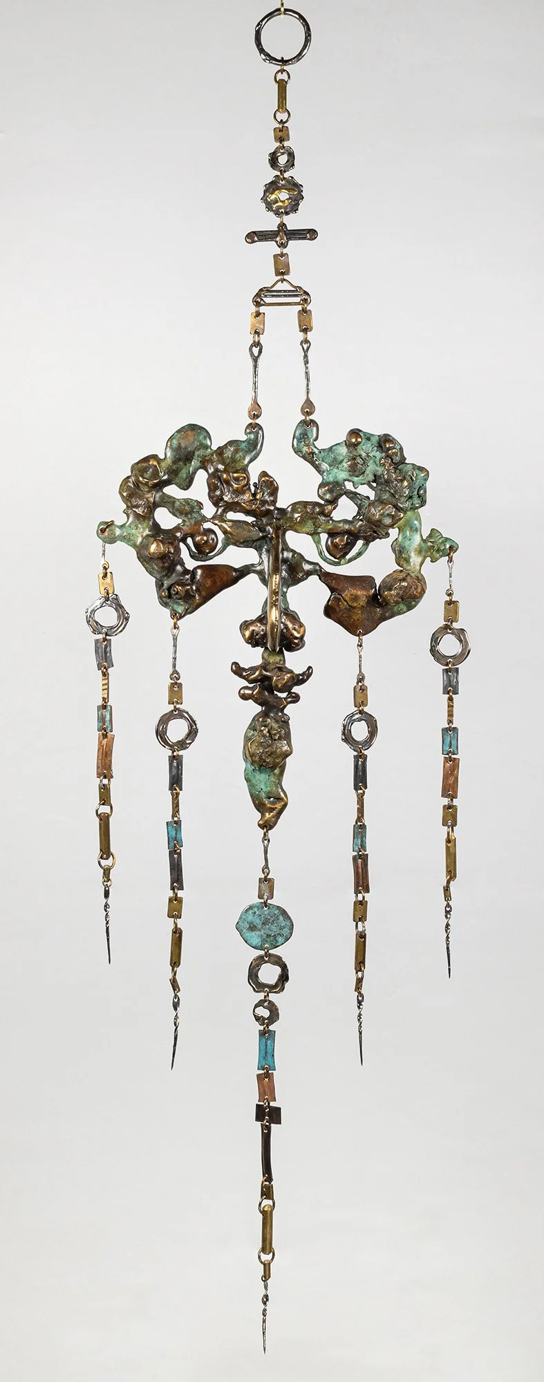 Composure II, Green, 2007. Bronze poured directly into sand, then composed with brass, copper, and stainless steel, every element smithed and assembled by hand. 13 × 46 inches. 1 of 1. Available. Price on inquiry.