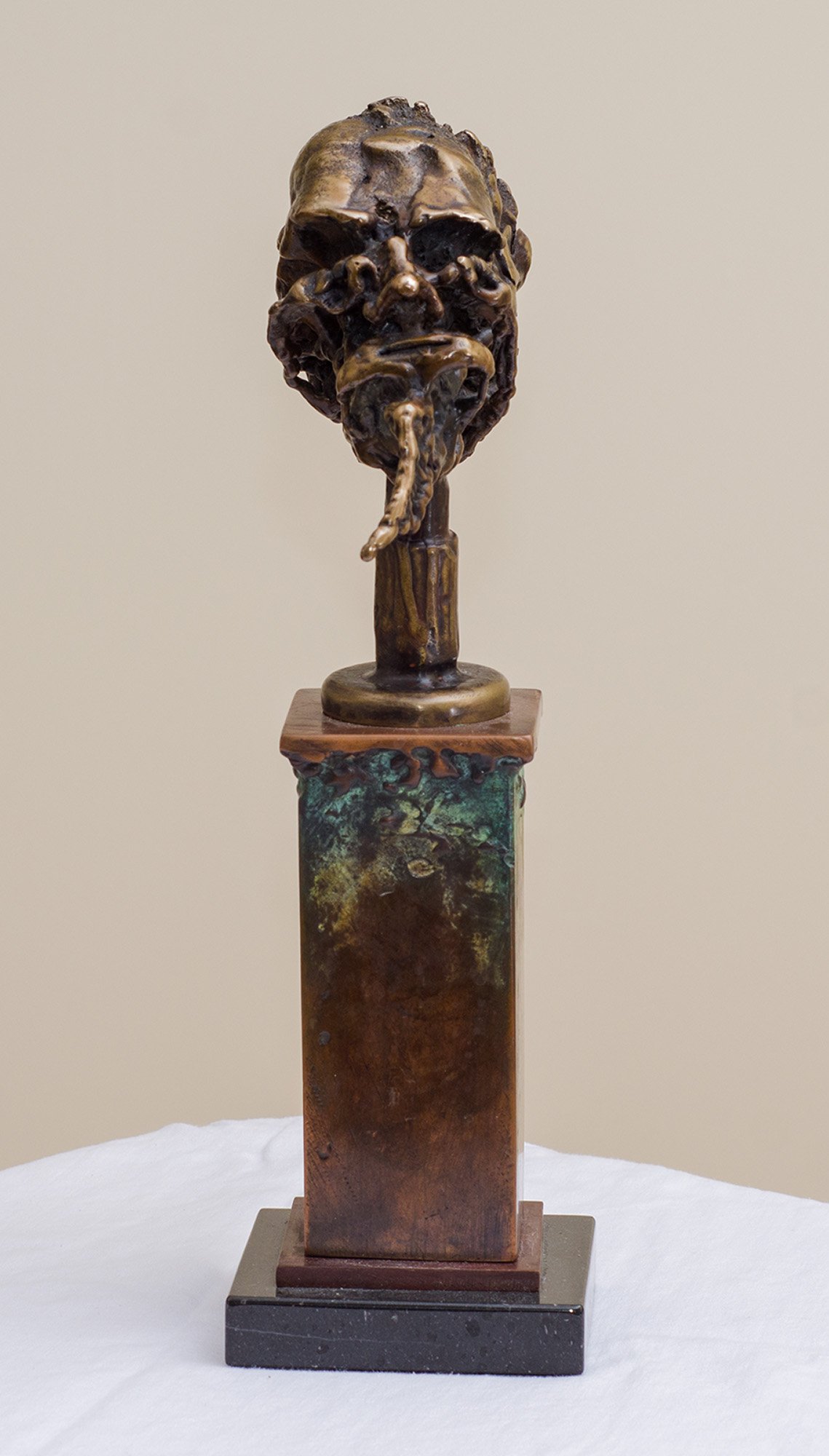 Unspoken Wisdom. 2017. Patinated bronze, copper, marble. 17 x 10 x 36 cm. Available