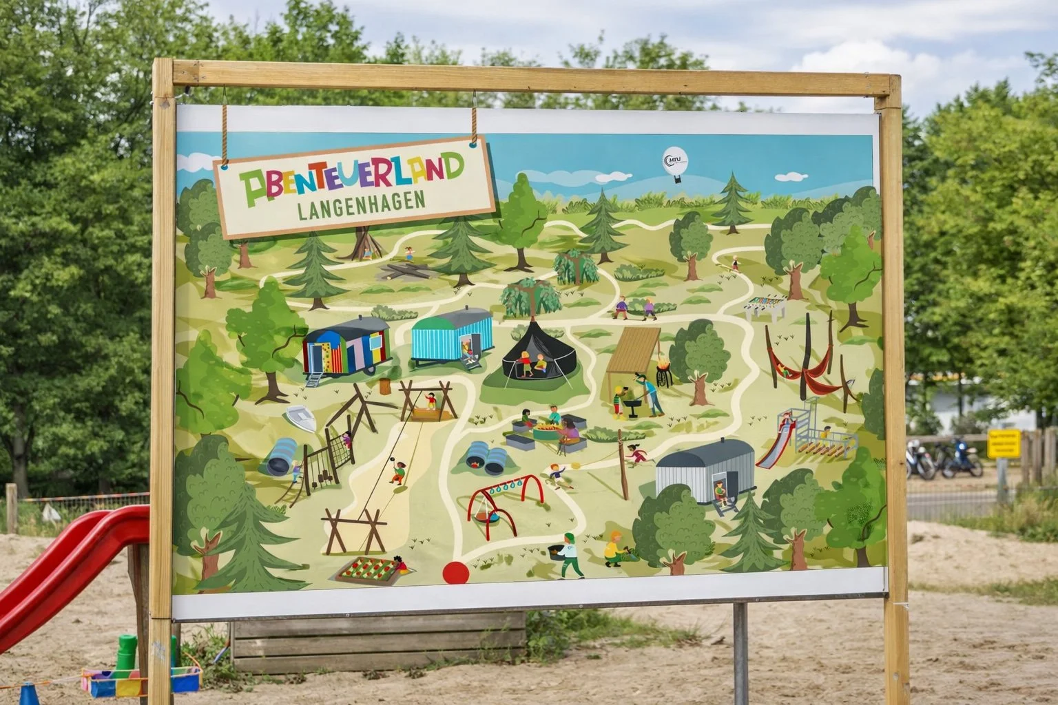 Spielplatzkarte des Abenteuerlandes in Langenhagen mit verschiedenen Spielgeräten, Bäumen und Wegen.