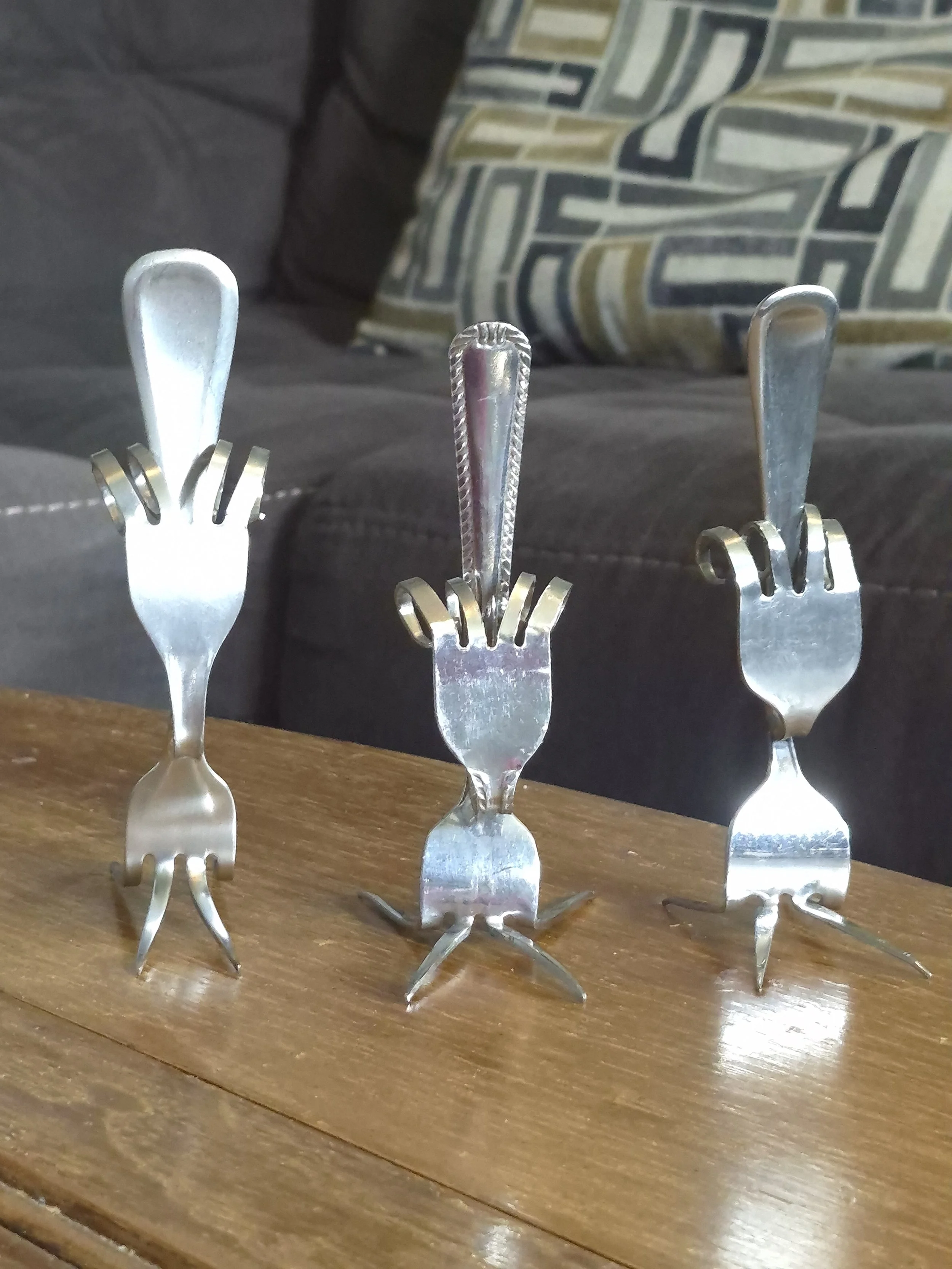 "Fork U" -  Handcrafted art made from repurposed silverware, turned into fun and quirky conversation pieces.

| Price: $15 |
Quantity in stock: 3