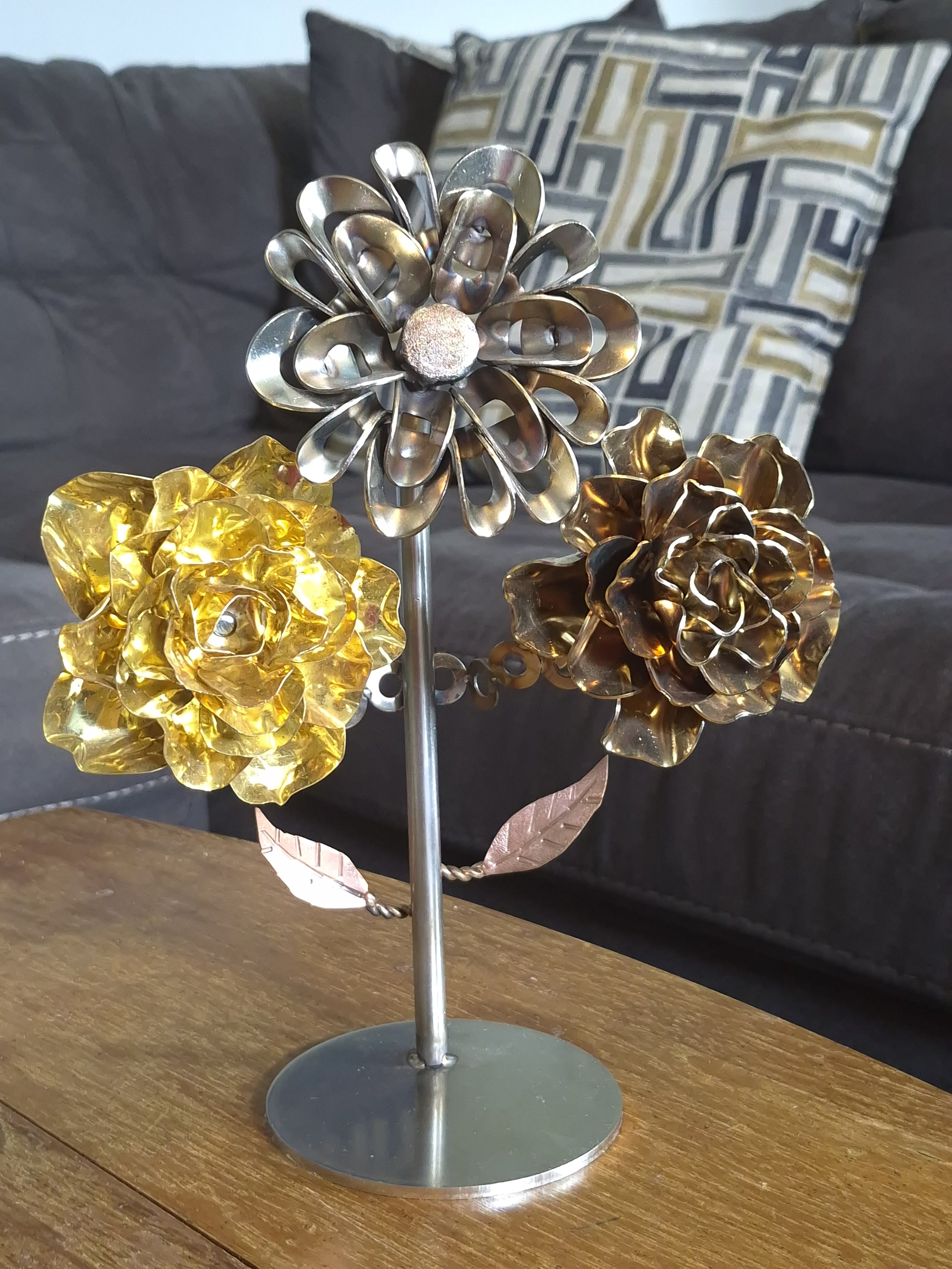 This one of a kind floral piece blends industrial craftsmanship with artistic design. A unique statement piece for your home, office, or gift collection.

| Price: $325 |
Quantity in stock: 1