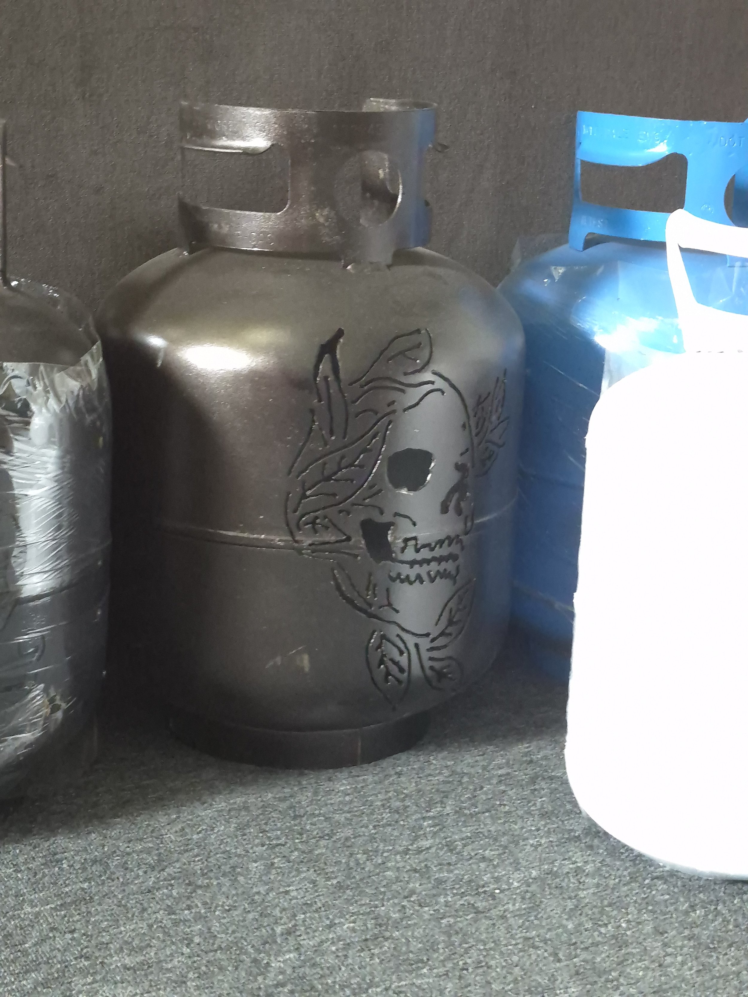 Skull scrap o' lantern. Repurposed propane tank transformed into edgy custom decor! 

| Price: $100 |
Quantity in stock: 1