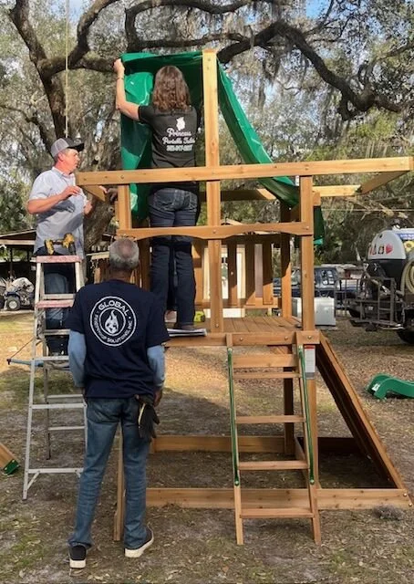 Global Fireproof Solutions Volunteers with FBMA and Roc Solid Foundation to Build Playset for Local Child Battling Cancer.