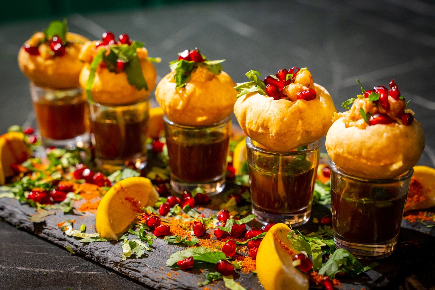 Canapés presented individually in small glasses