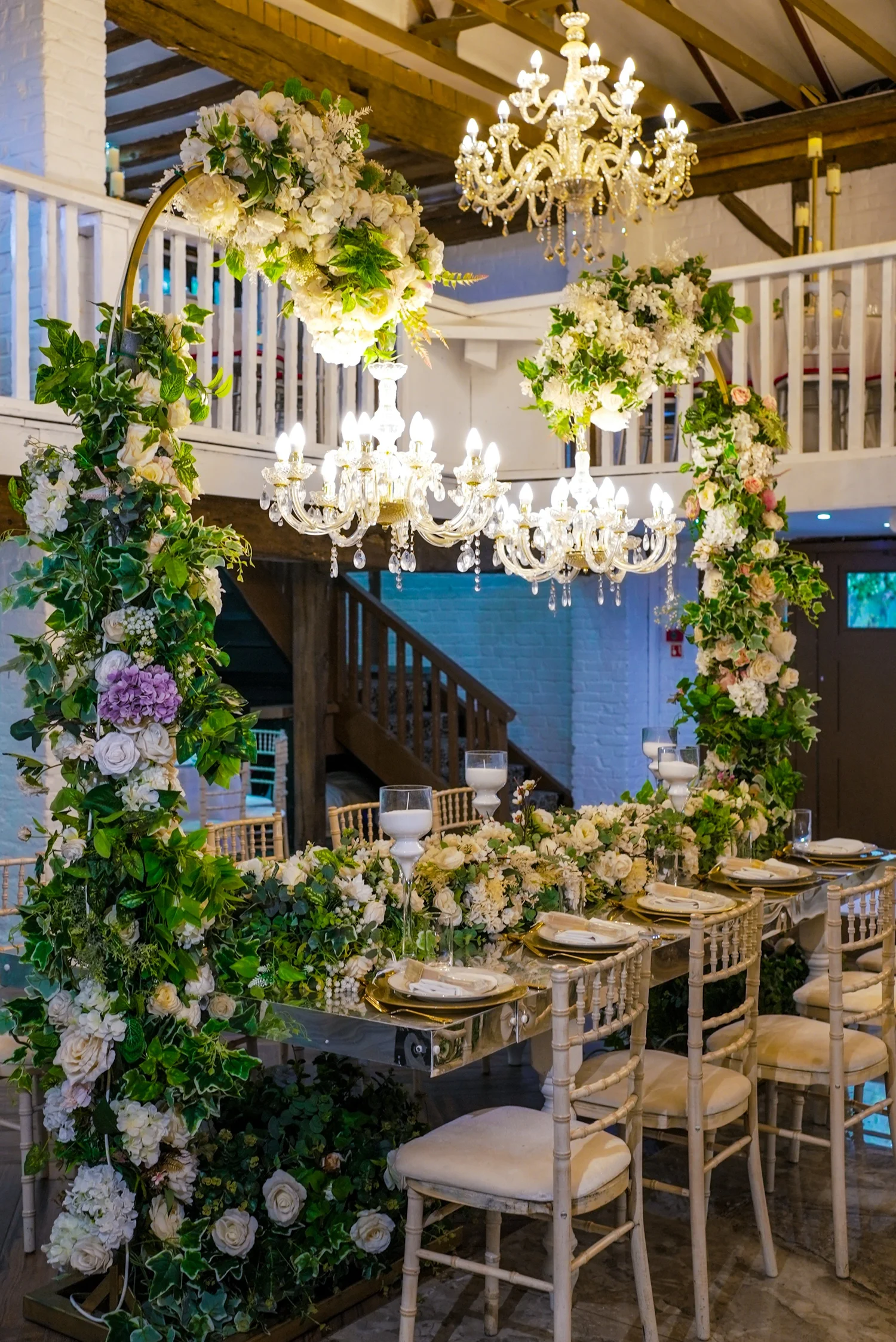 Floral pillars and chandeliers framing the Grand Hall