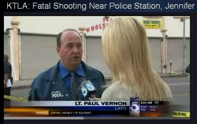 News interview at the scene of a fatal shooting near a police station, with a LAPD officer named Lt. Paul Vernon speaking to a reporter, KTLA news banner and street scene in the background.